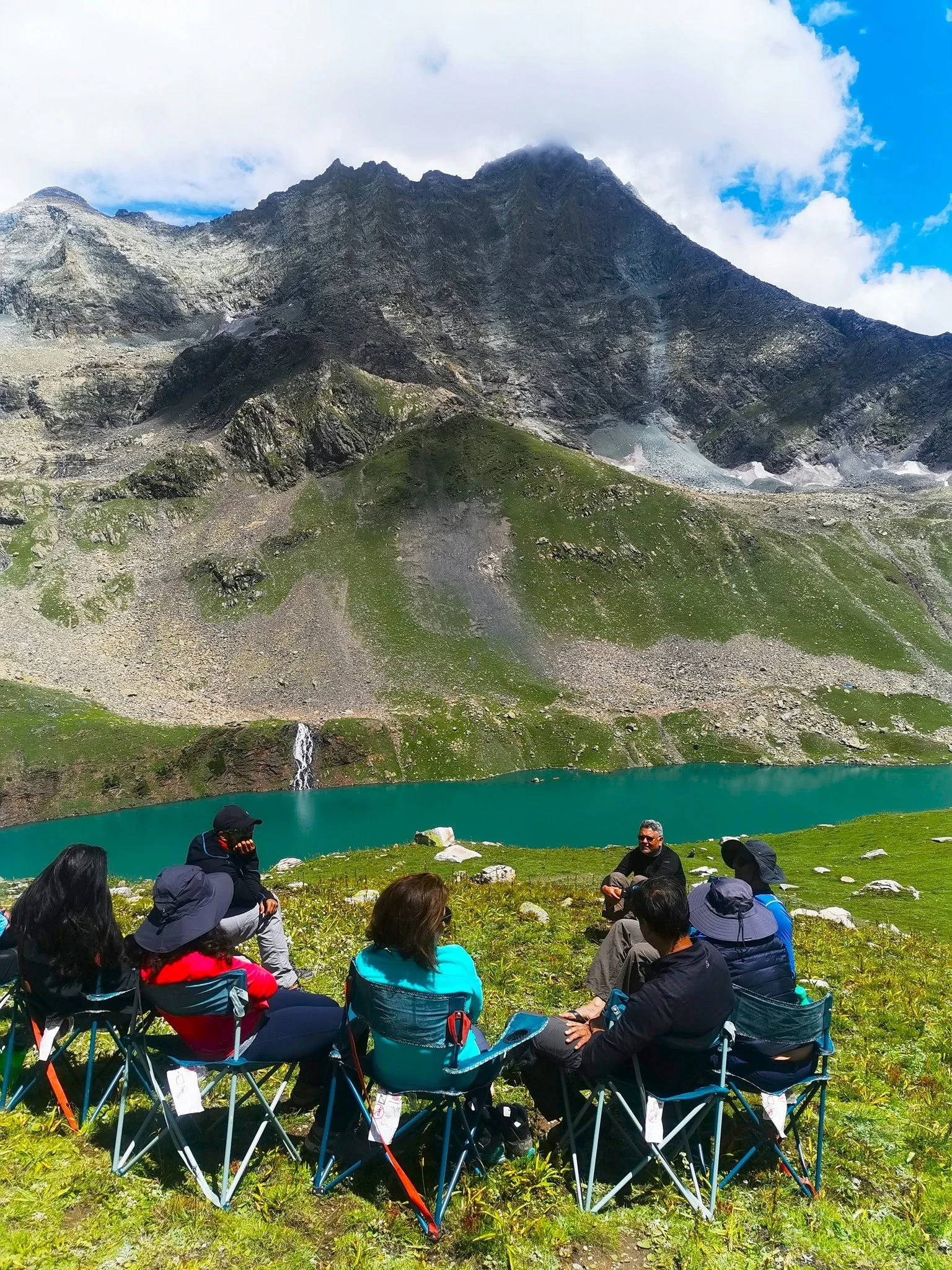 This is what our rest day looks like at 13,000 feet in Kashmir.
Post lunch, nowhere to be, just a group of friends sitting in fold up chairs above Basmai Lake watching the mountains and not saying very much. Nobody needed to.
I've been leading treks 