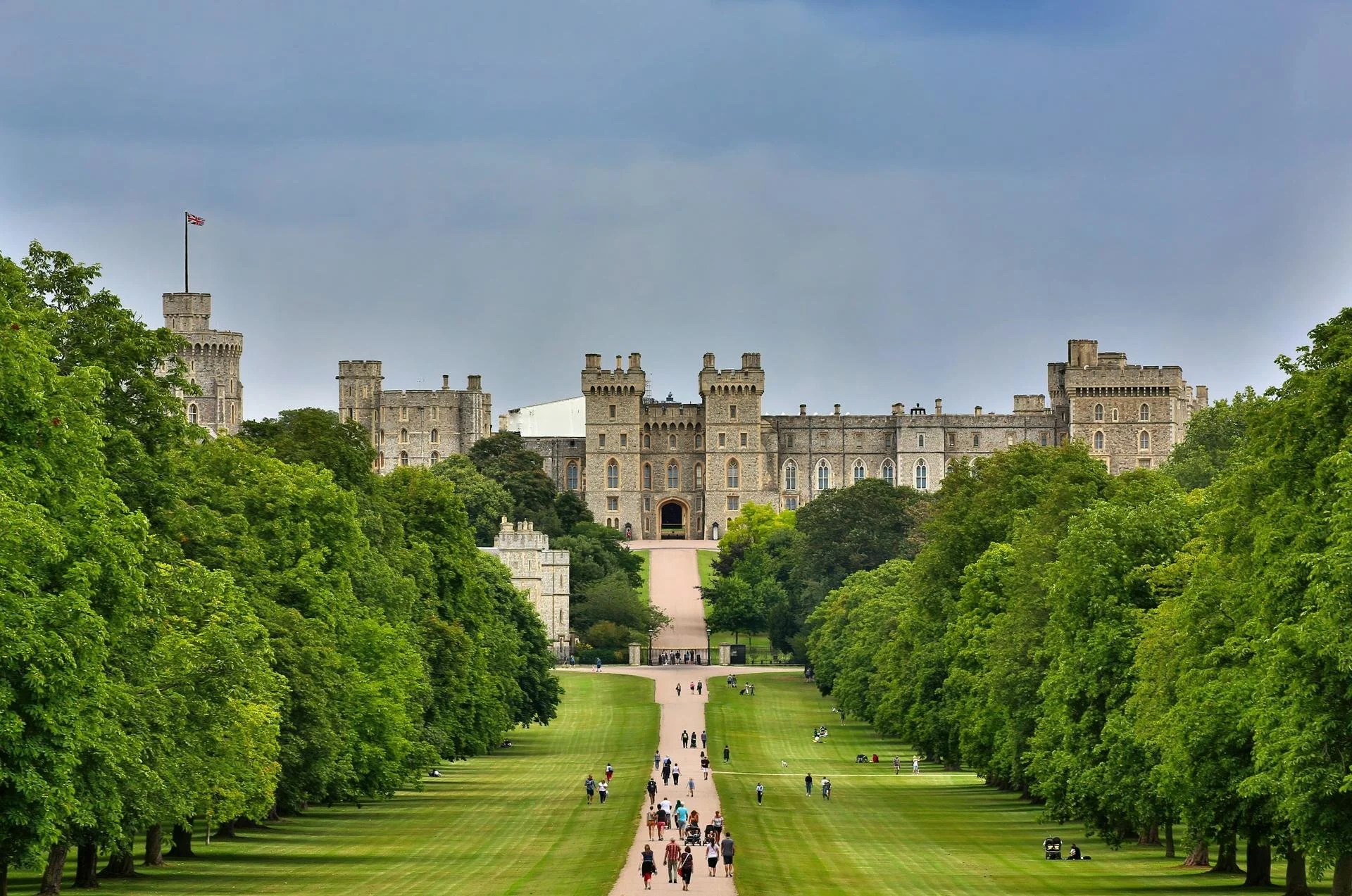 a view of windsor castle from the green field entrance below