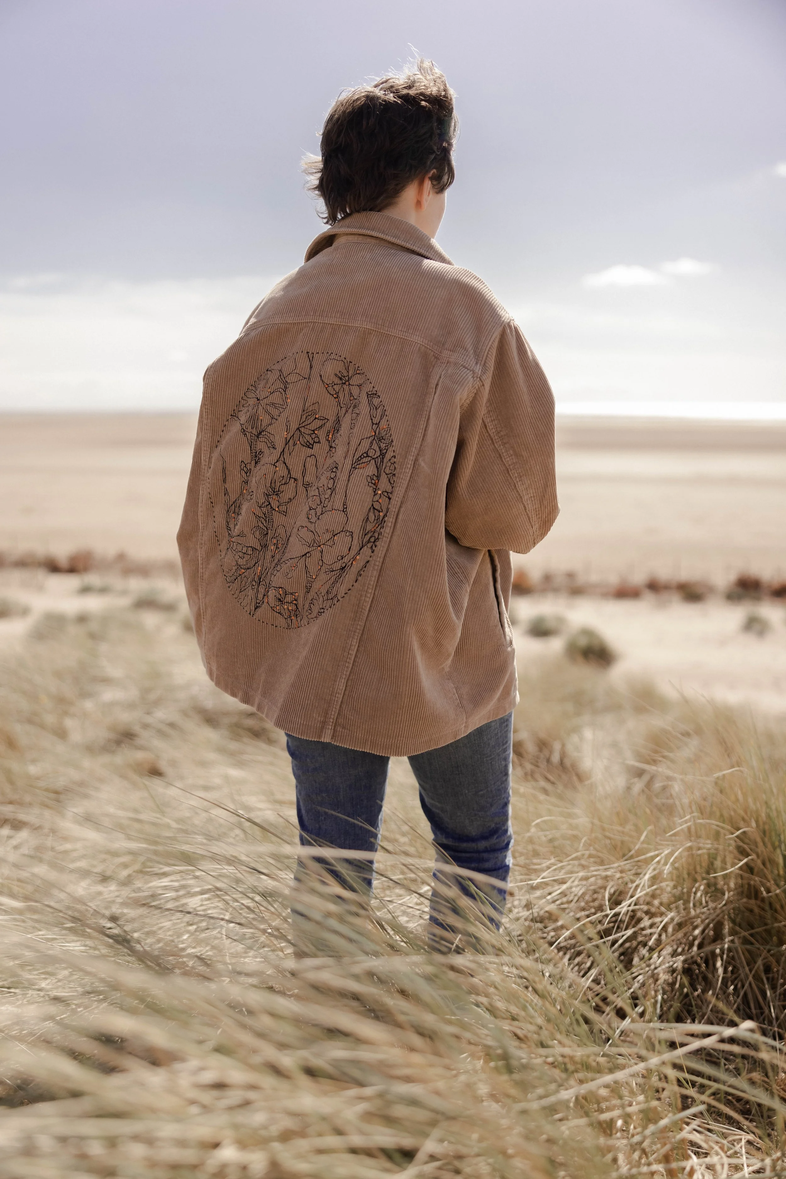 cord jacket upcycled with freehand machine embroidery