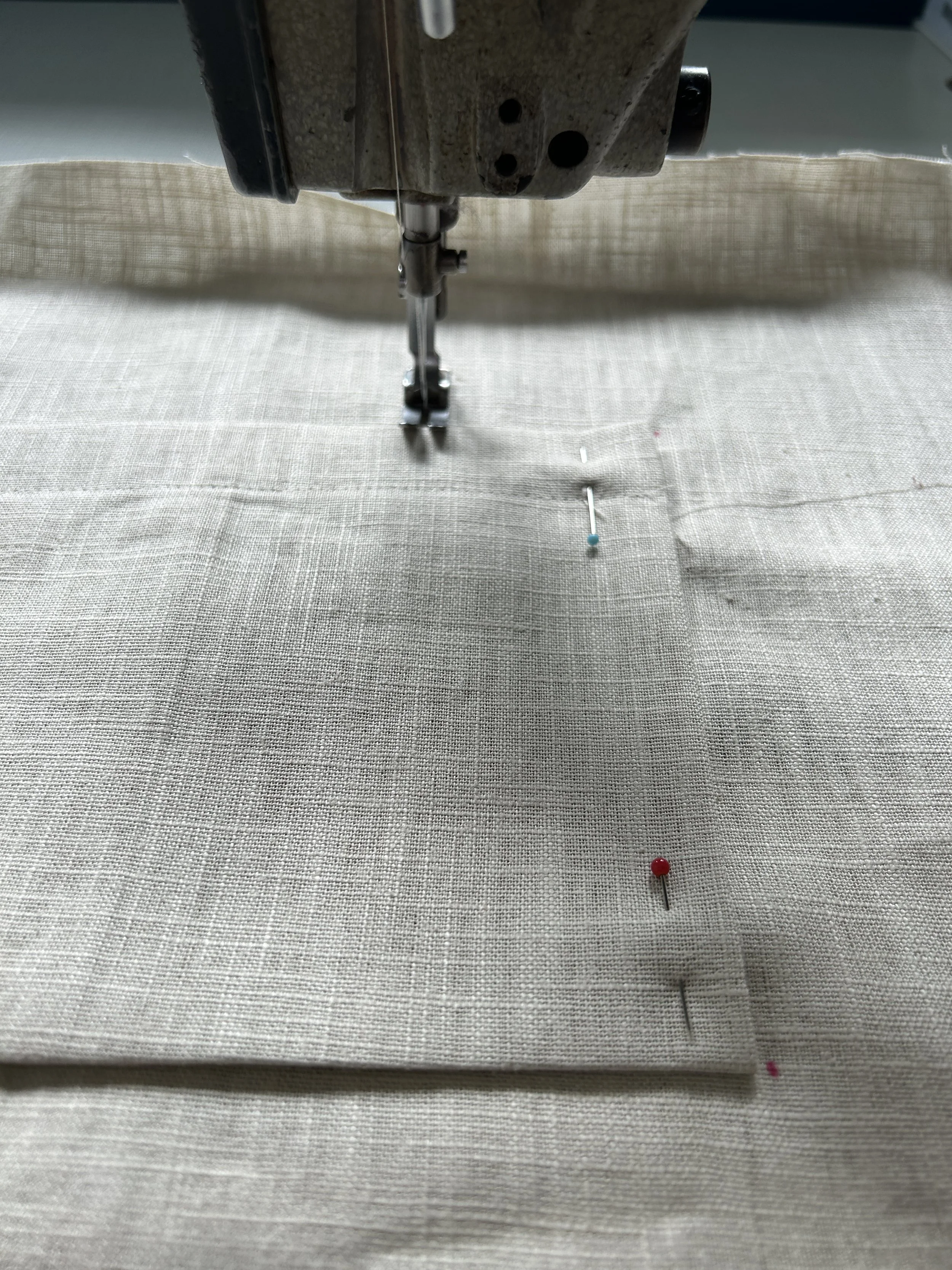 industrial sewing machine stitching organic linen fabric