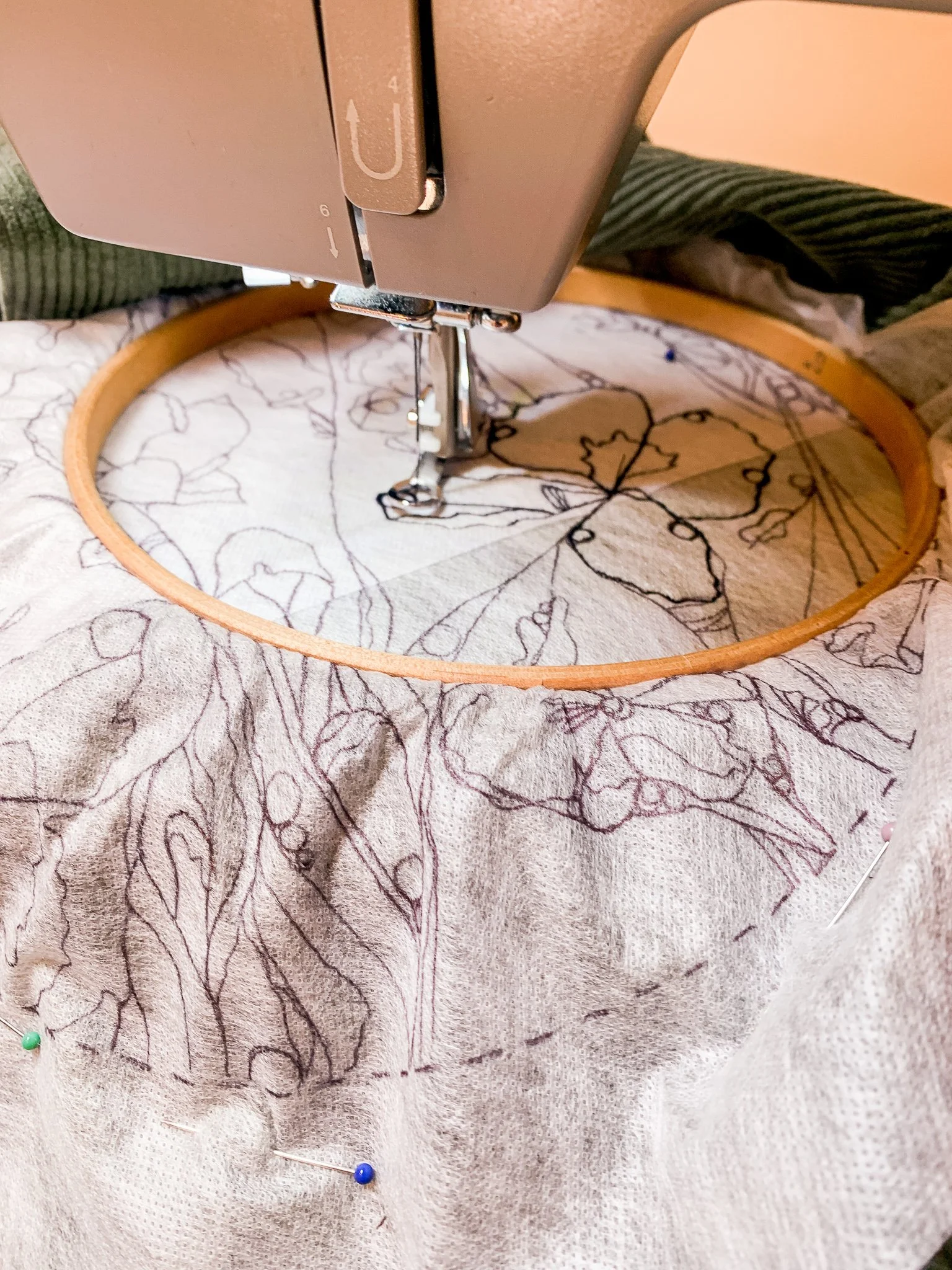 Freehand machine embroidery on an upcycled corduroy jacket
