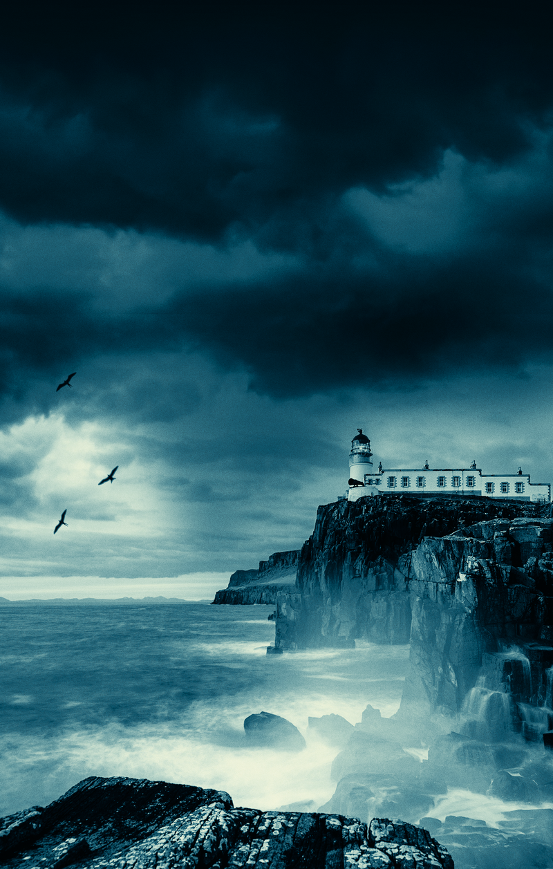 A lighthouse on a rocky cliff overlooking the sea under dark stormy clouds, with three birds flying overhead.