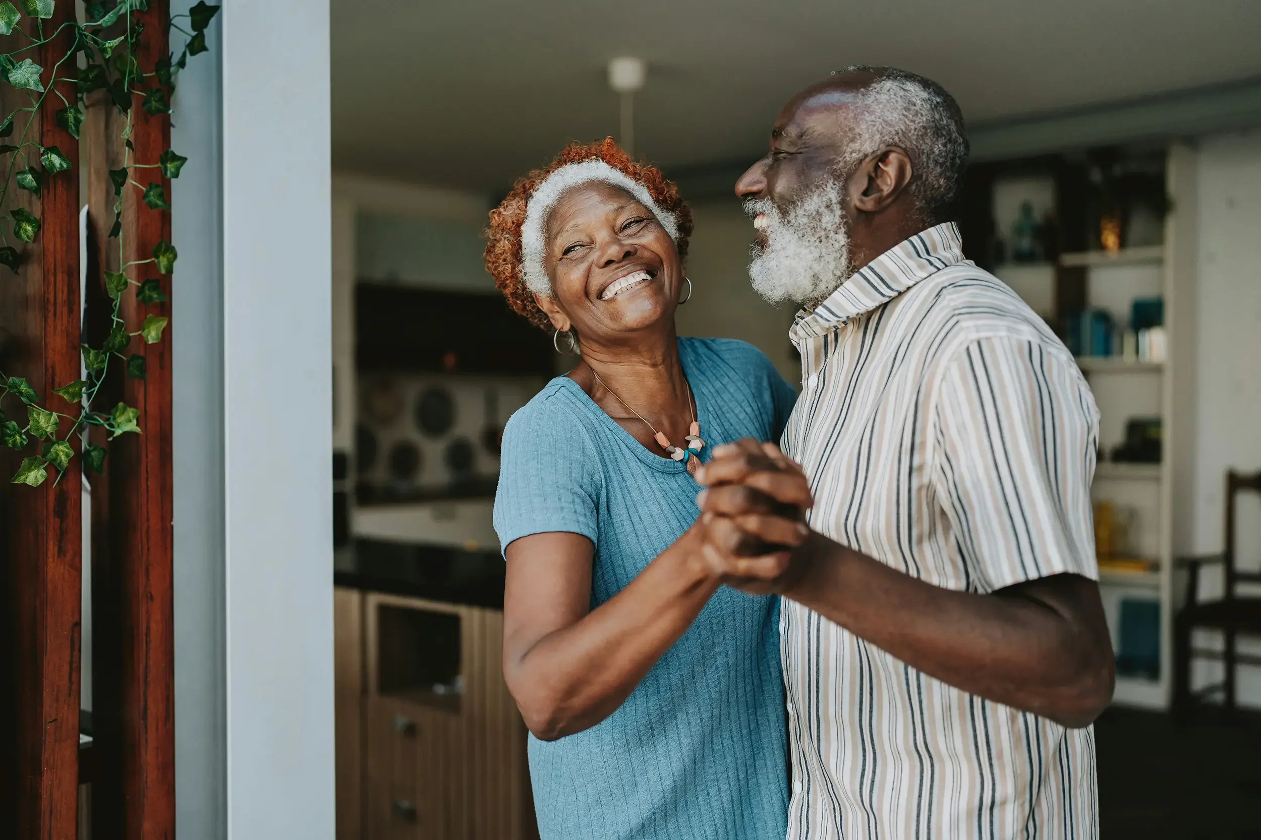 An elderly couple dancing together after acupuncture for chronic pain and neuropathy.