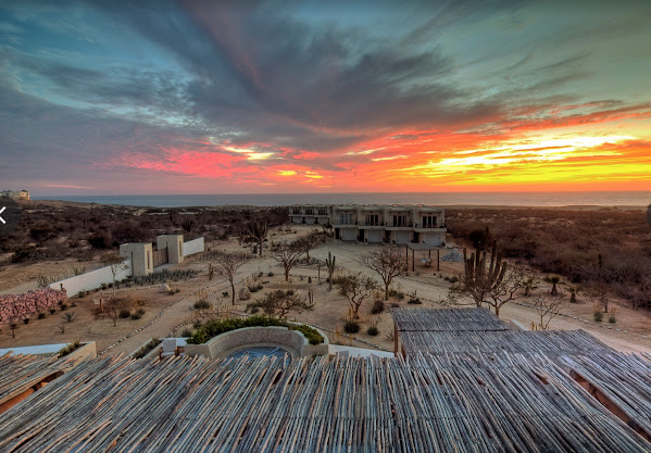 Baja Mexico retreat property featured on a Studio One Yoga experience, with poolside loungers with Studio One yoga Retreats