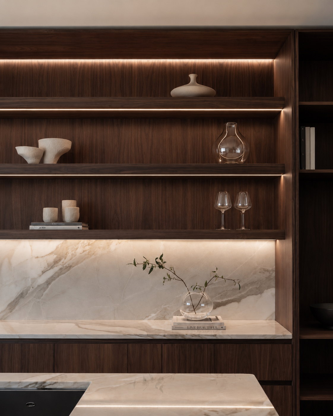 Custom kitchen shelving with integrated lighting and display storage | KP Design Studio