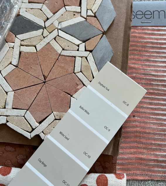 Colorful mosaic tile sample with a color palette labeled Elephant Tusk, Ballet White, White Sand, and Clay Beige.