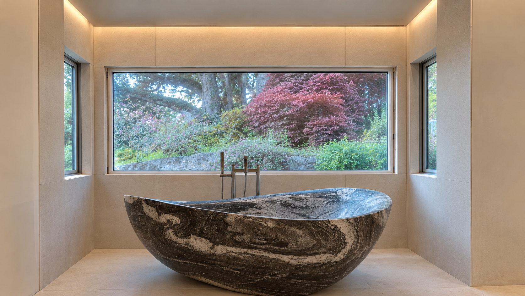 Freestanding stone bathtub beneath a garden picture window