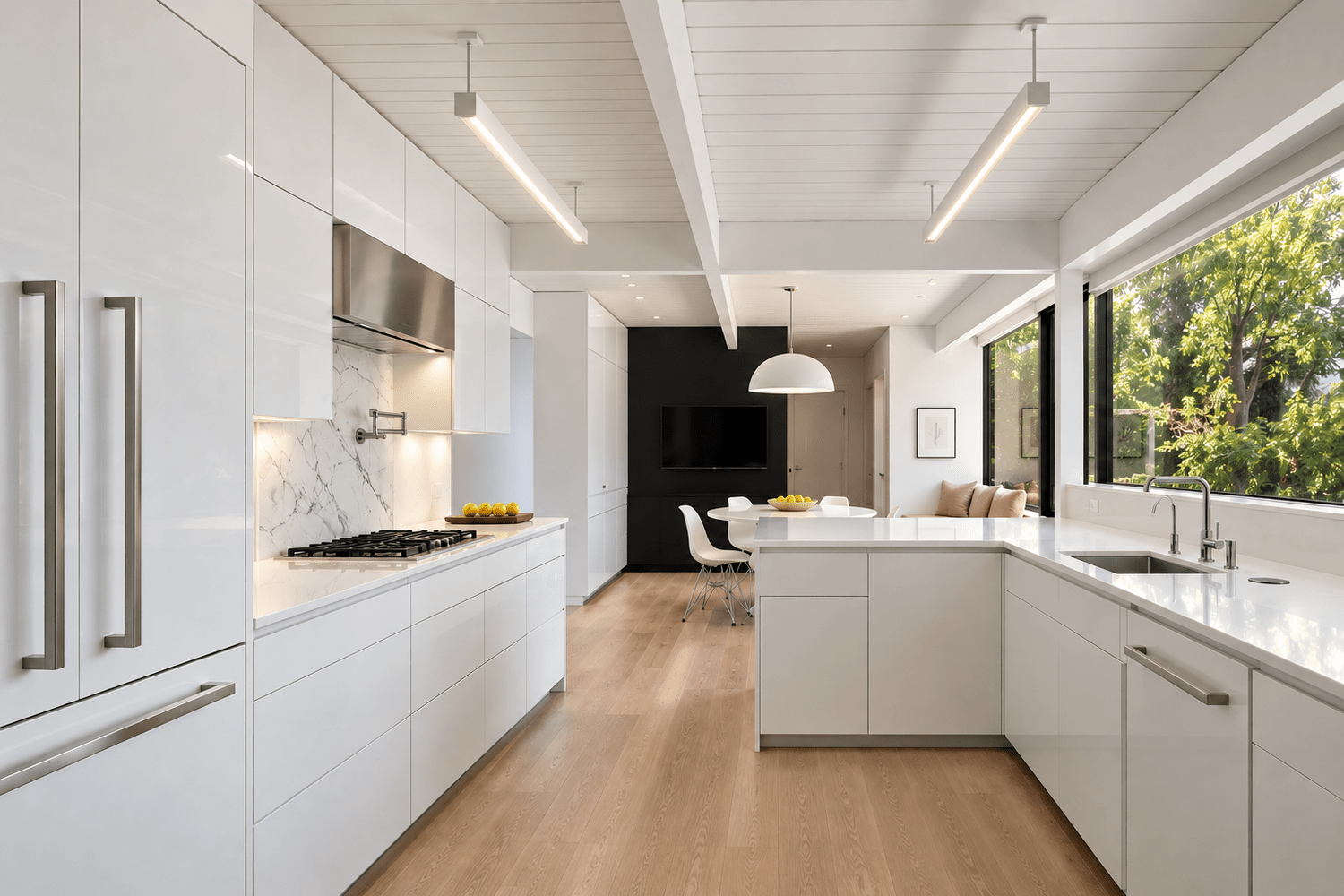 Eichler Residence kitchen in white lacquer with marble backsplash, oak floors and garden windows