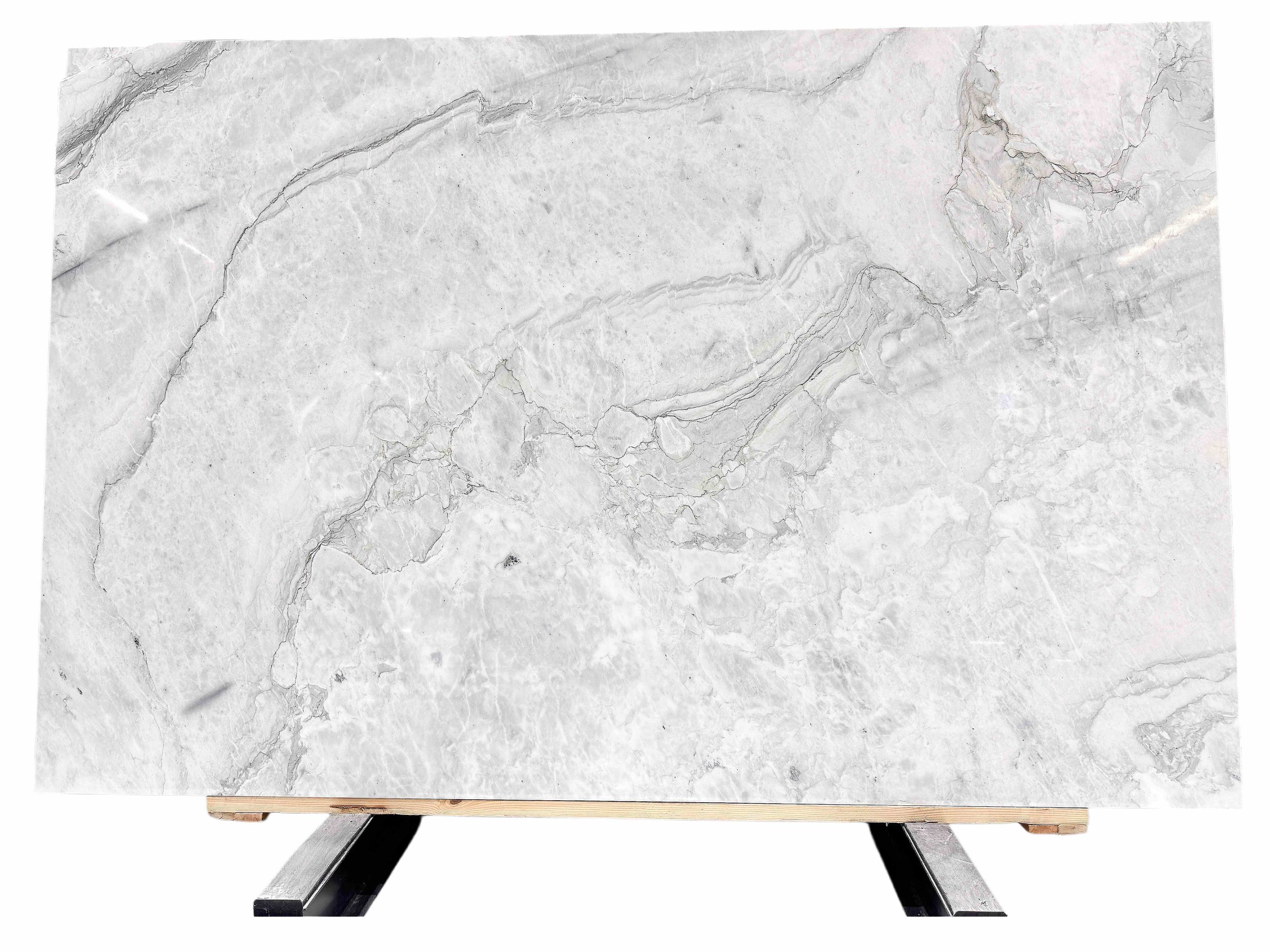 A marble slab countertop with gray and white veining, supported by black metal legs.