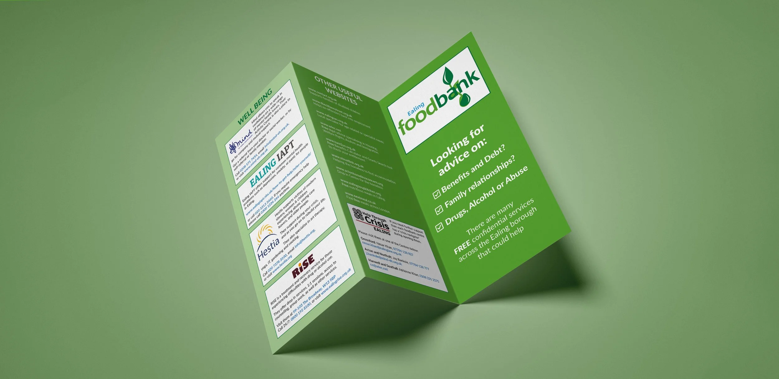 Green tri-fold pamphlet titled 'Eating foodbank' with advice on benefits, family relationships, and drug or alcohol abuse, on a green background.