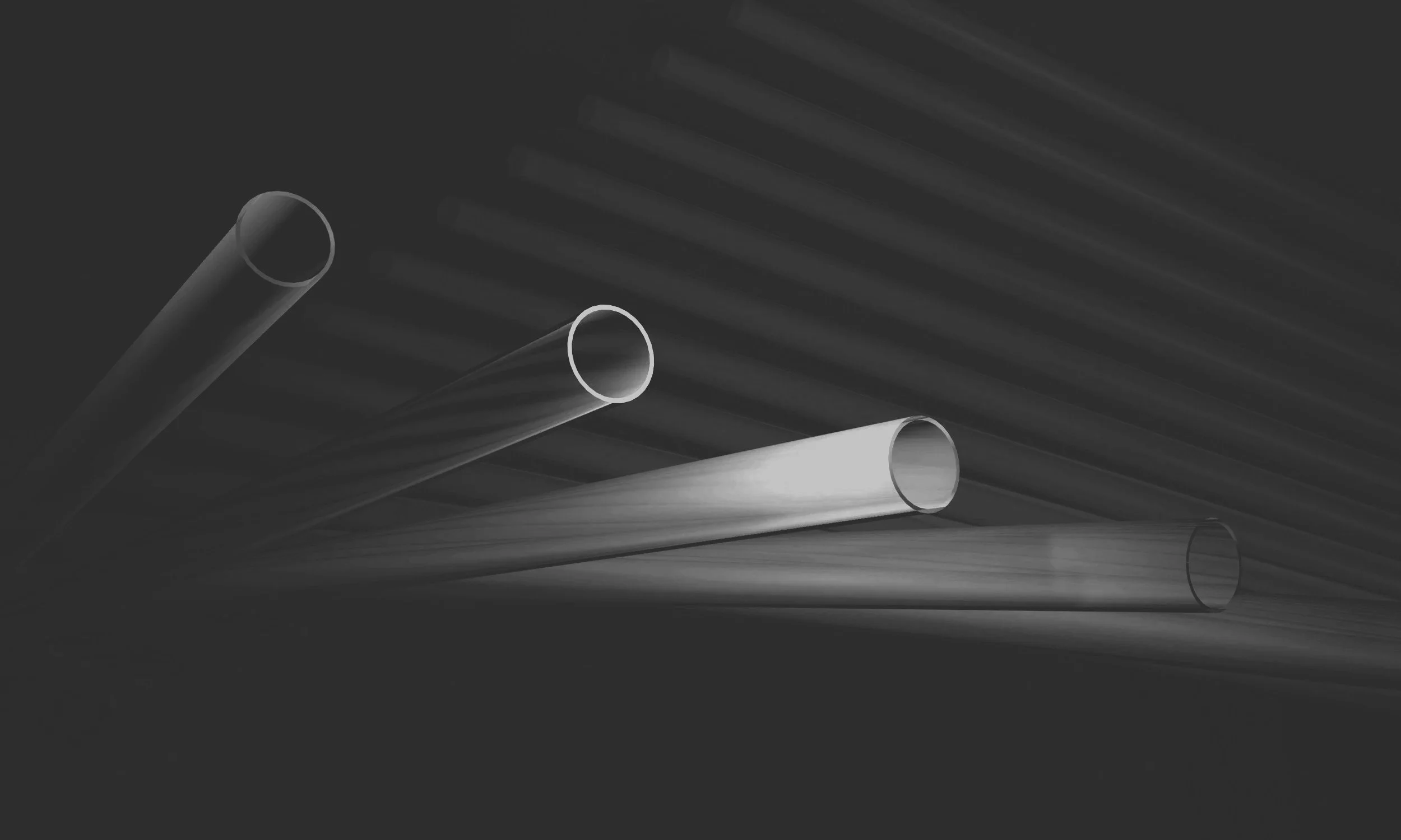 A black and white photograph of several metal pipes lying on a diagonal, with shadows cast between them and a textured, striped surface in the background.