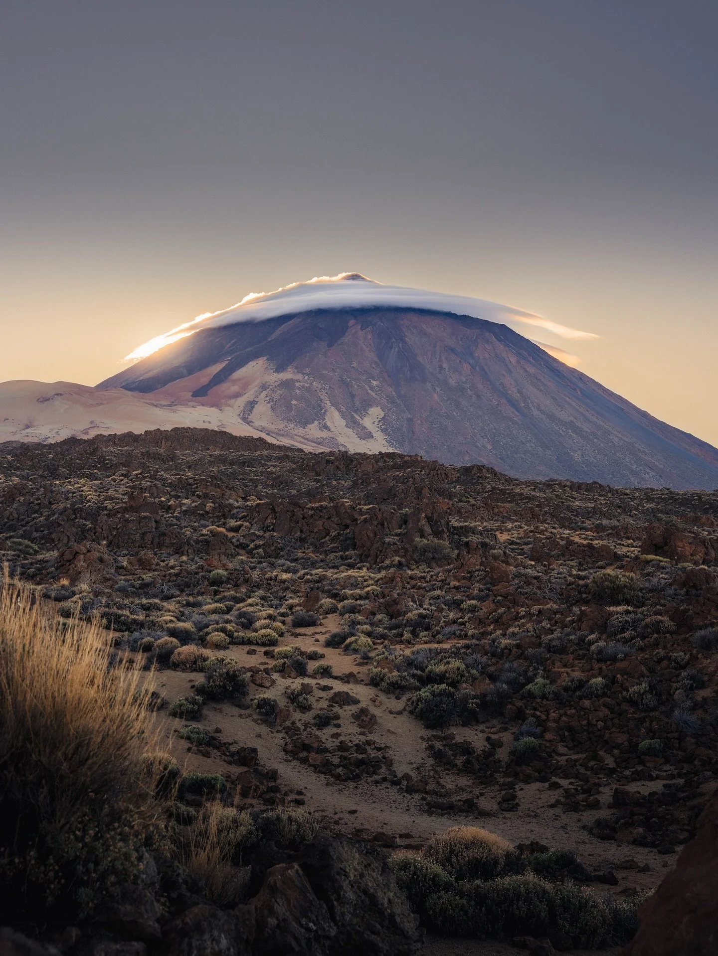 Mt. Teide ⛰️ ☁️ //

We were making our way back across the deserts around Mount Teide. I was looking for the perfect place to pop the question, I spotted Teide adorned with a crown, a halo cloud with the setting sun right behind, I couldn&rsquo;t bel