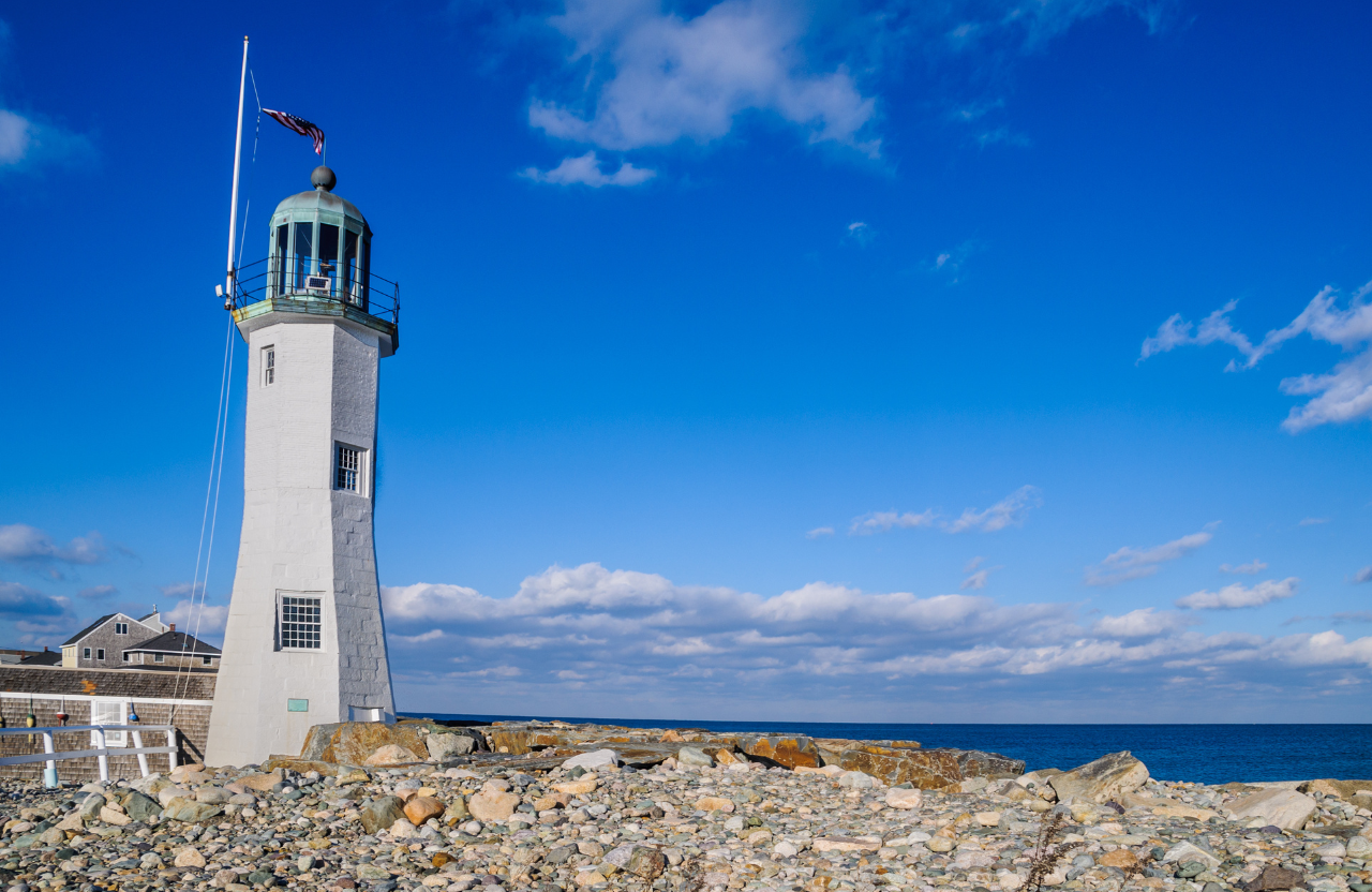Scituate Lighthouse overlooking Scituate Harbor in Scituate, Massachusetts, a scenic South Shore landmark near local 55+ communities and coastal homes.