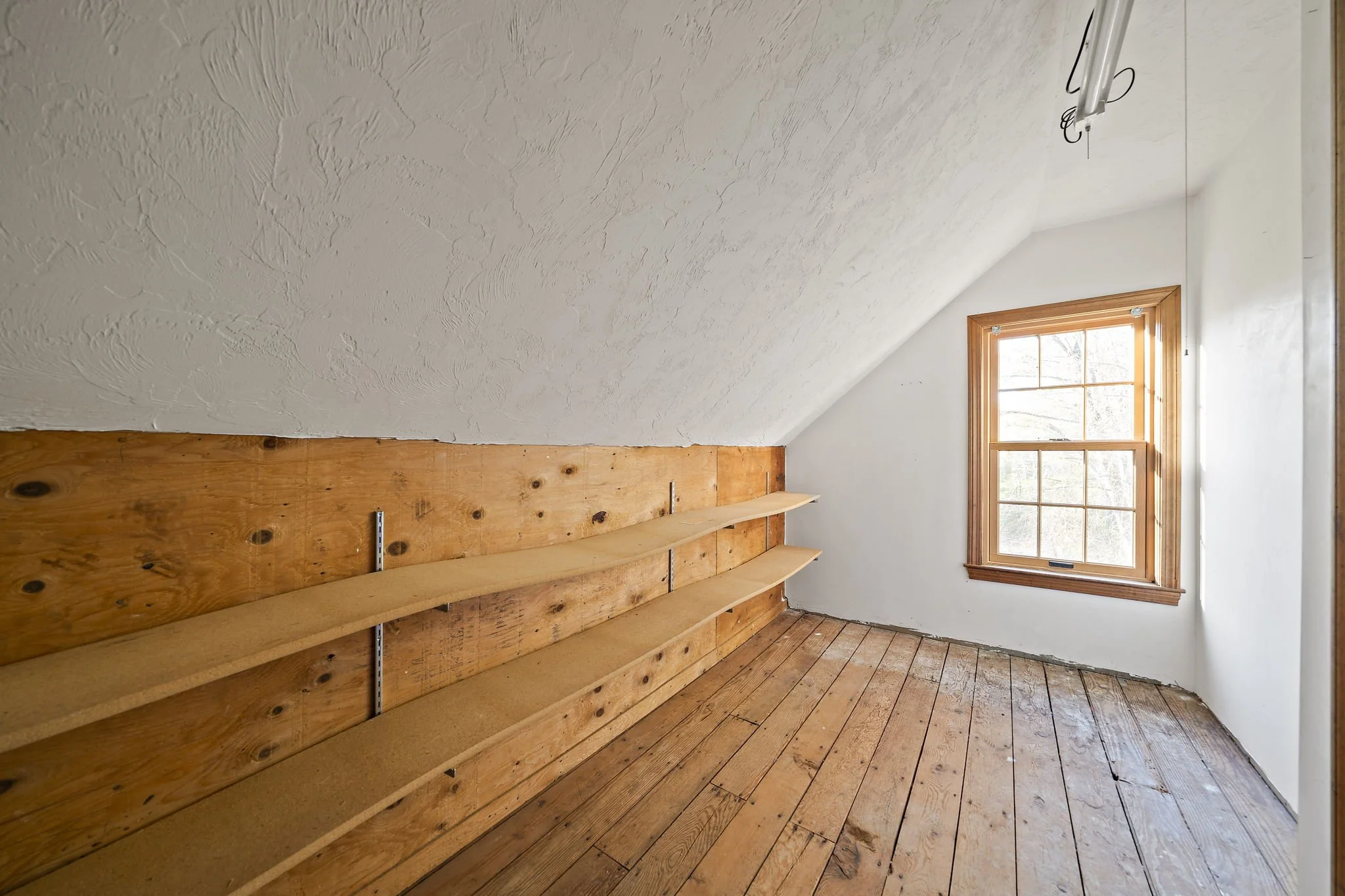 Front upstairs storage space in Cape-style home at Hanson MA property