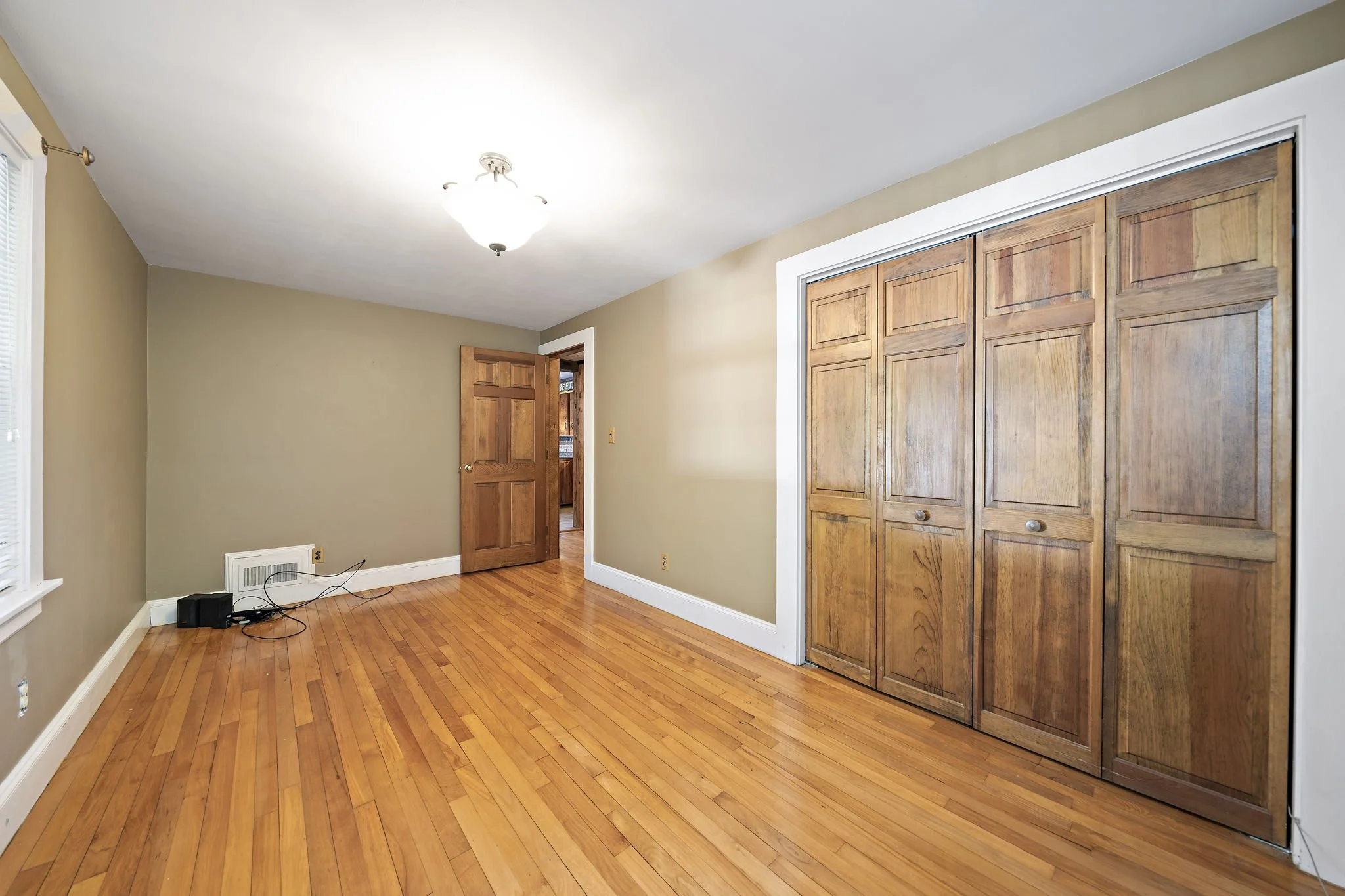 First floor bedroom offering flexible living space at 63 Reed Street Hanson MA