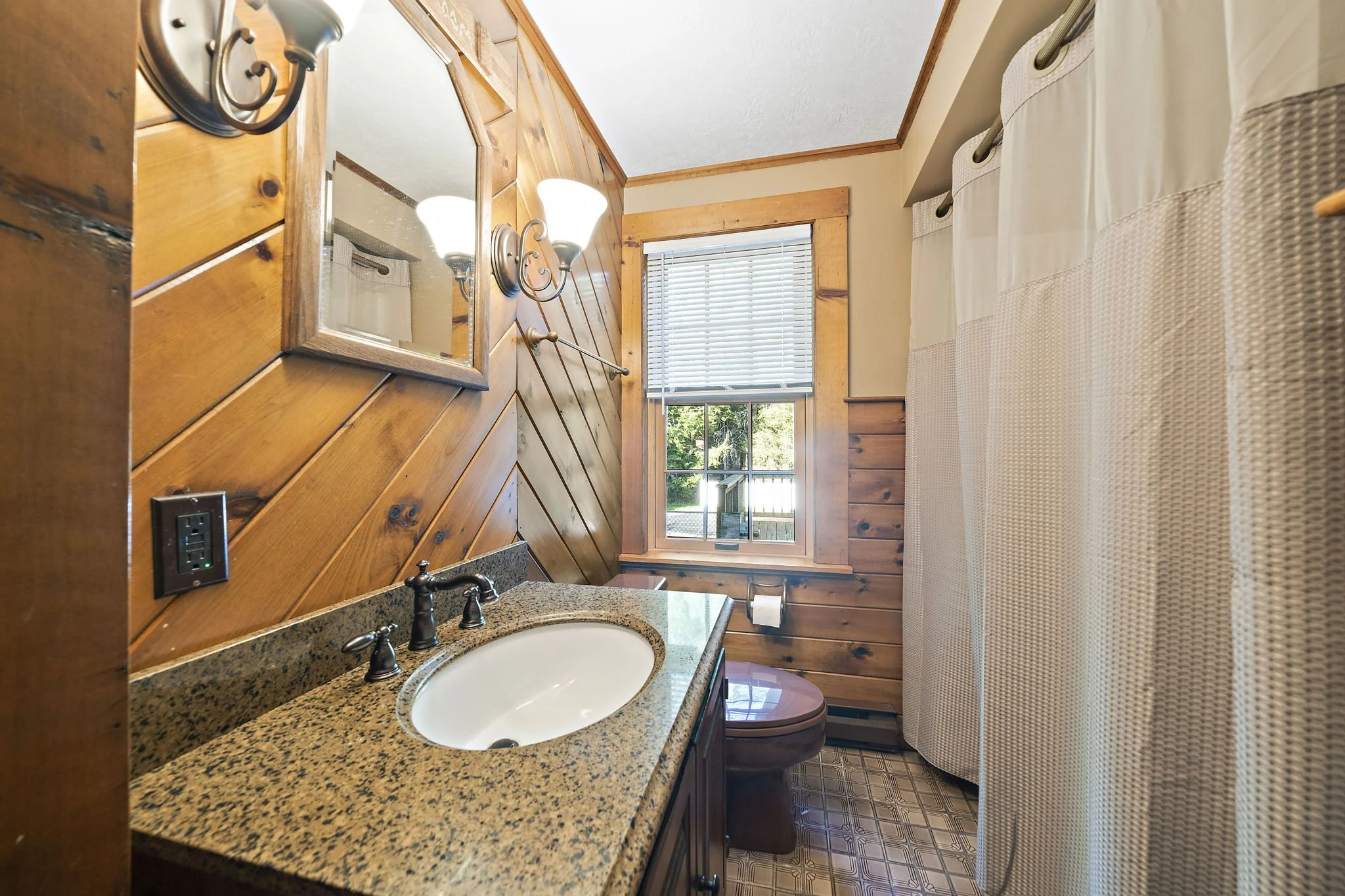 First floor full bathroom with updated tub at 63 Reed Street Hanson MA