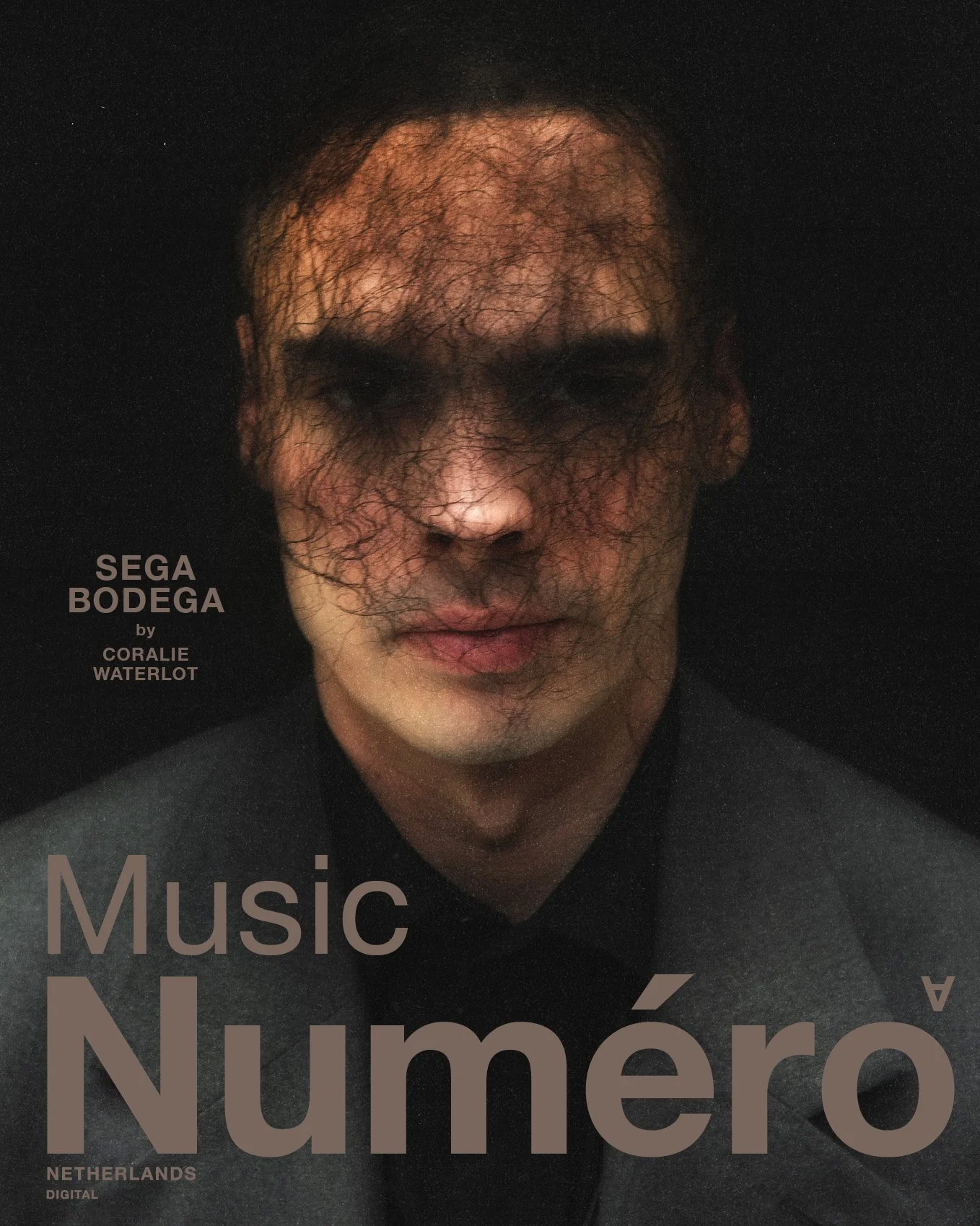 Cover of a music album titled 'Music Número' featuring a close-up image of a man's face with dark, curly lines across it, against a dark background.