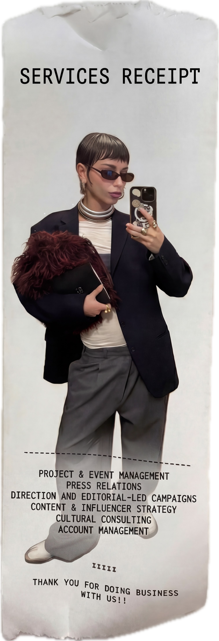 A woman taking a selfie in front of a mirror, holding a purse with a fur trim, wearing sunglasses, a black blazer, a striped turtleneck, gray pants, and accessorized with rings and earrings. The mirror has printed text listing services like project & event management, press relations, editorial campaigns, content & influencer strategy, cultural consulting, and account management, with a thank you note at the bottom.
