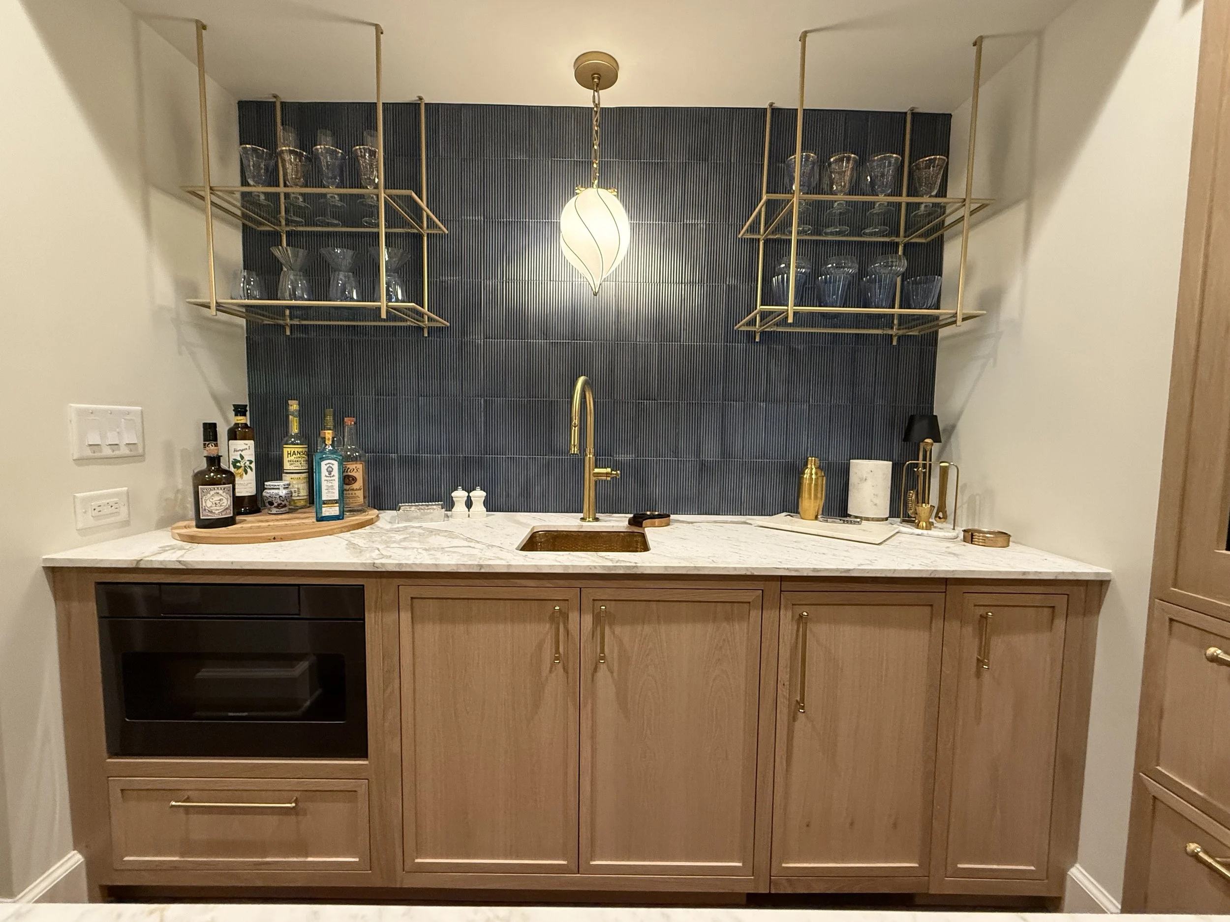 White oak bar with skinny shaker doors