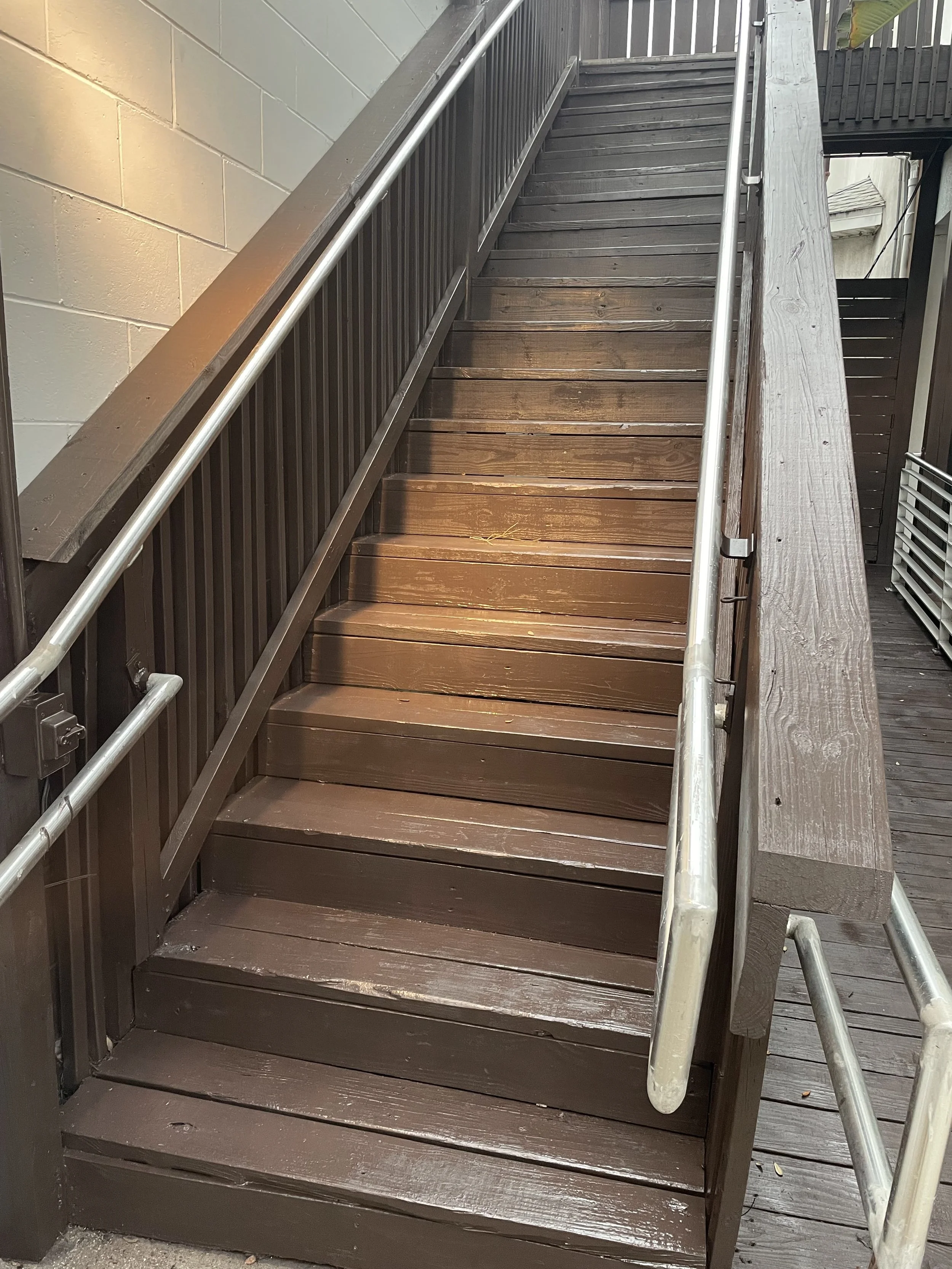 Painted Custom stairs and refurbished the damaged wood and stained to give new finish and sealed for lasting results