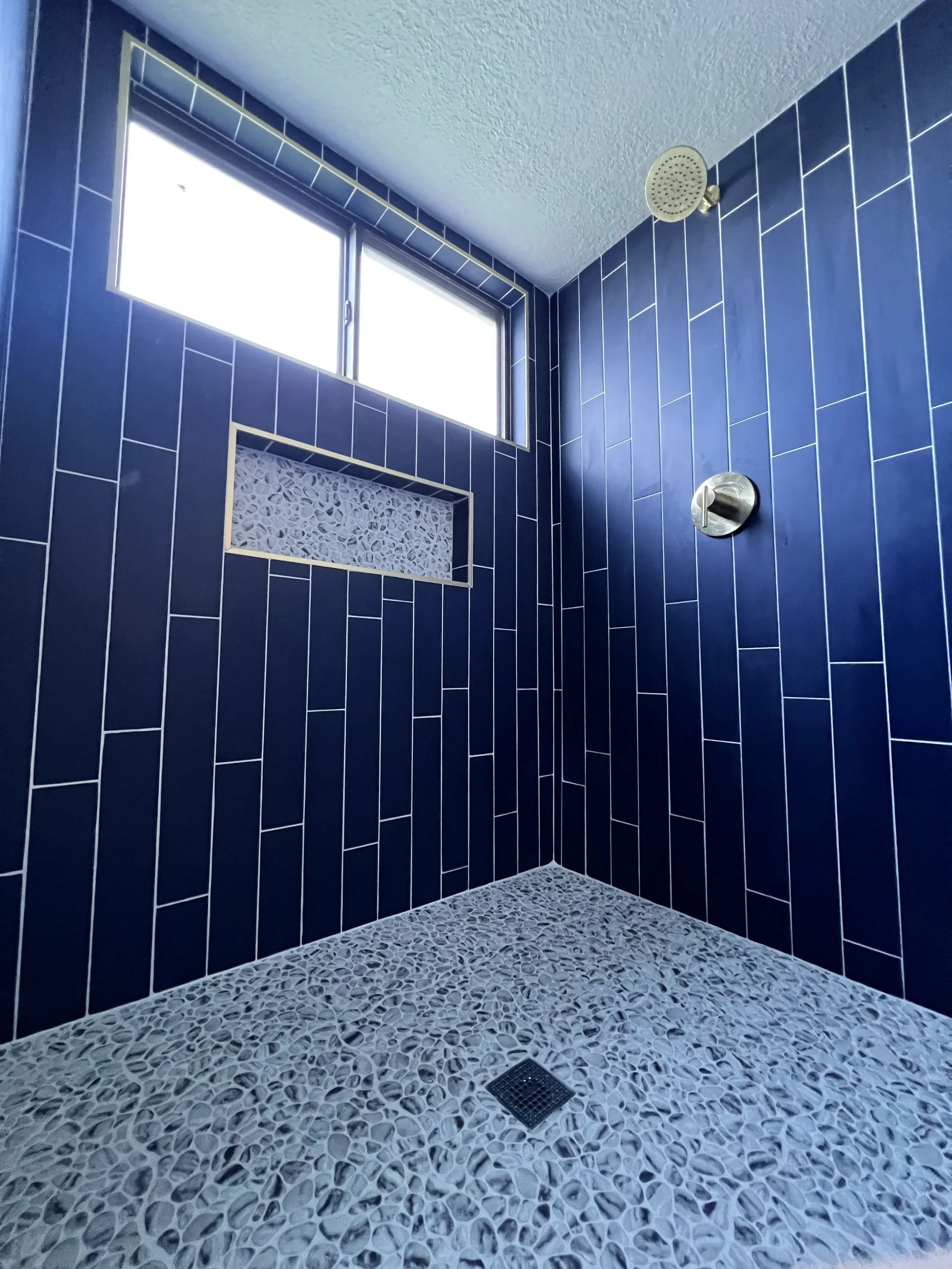 Custom Master Bathroom Remodel we completed in South Daytona, Florida. New shower, with custom tiling, new shower fixtures, beautiful craftsmanship. 