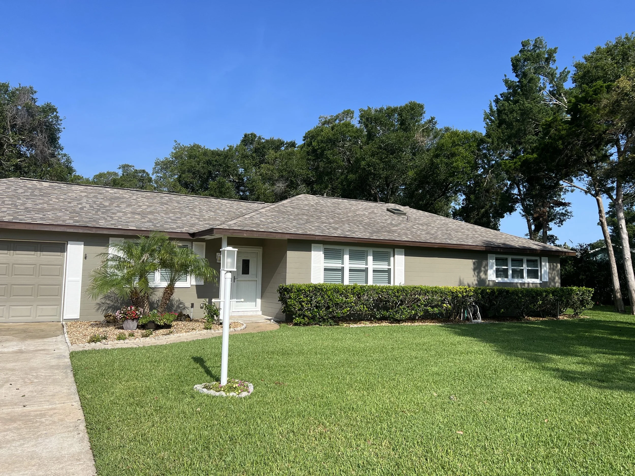 Exterior Painting of a Ormond Beach Block Home. Quality Products Sherwin Williams used and proper preparations