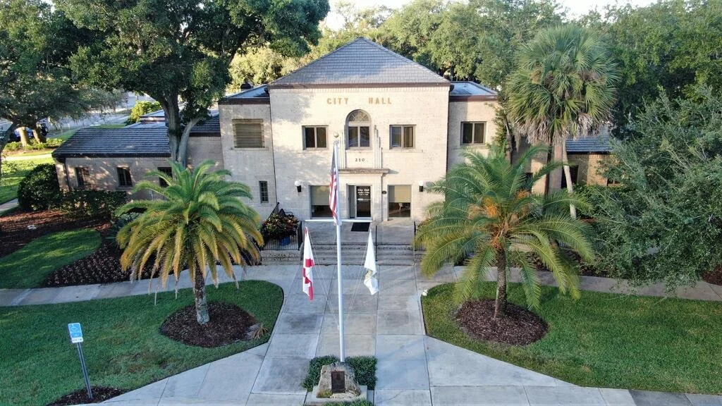 An aerial view of a city hall building for the City of New Smyrna Beach, Florida an area we work and service in.