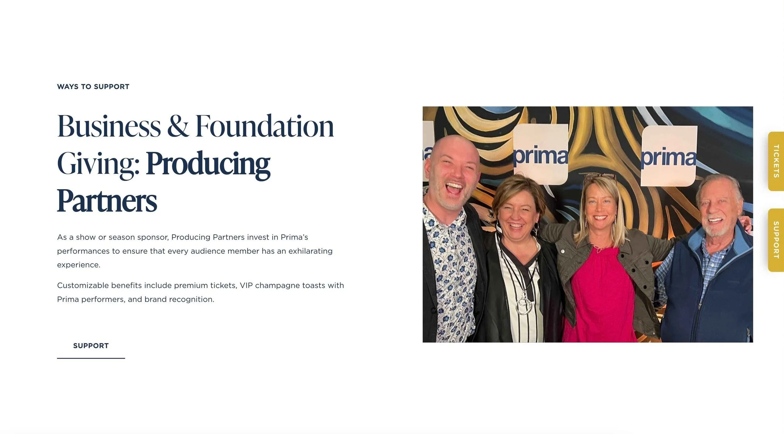 Group of people standing together in front of a banner