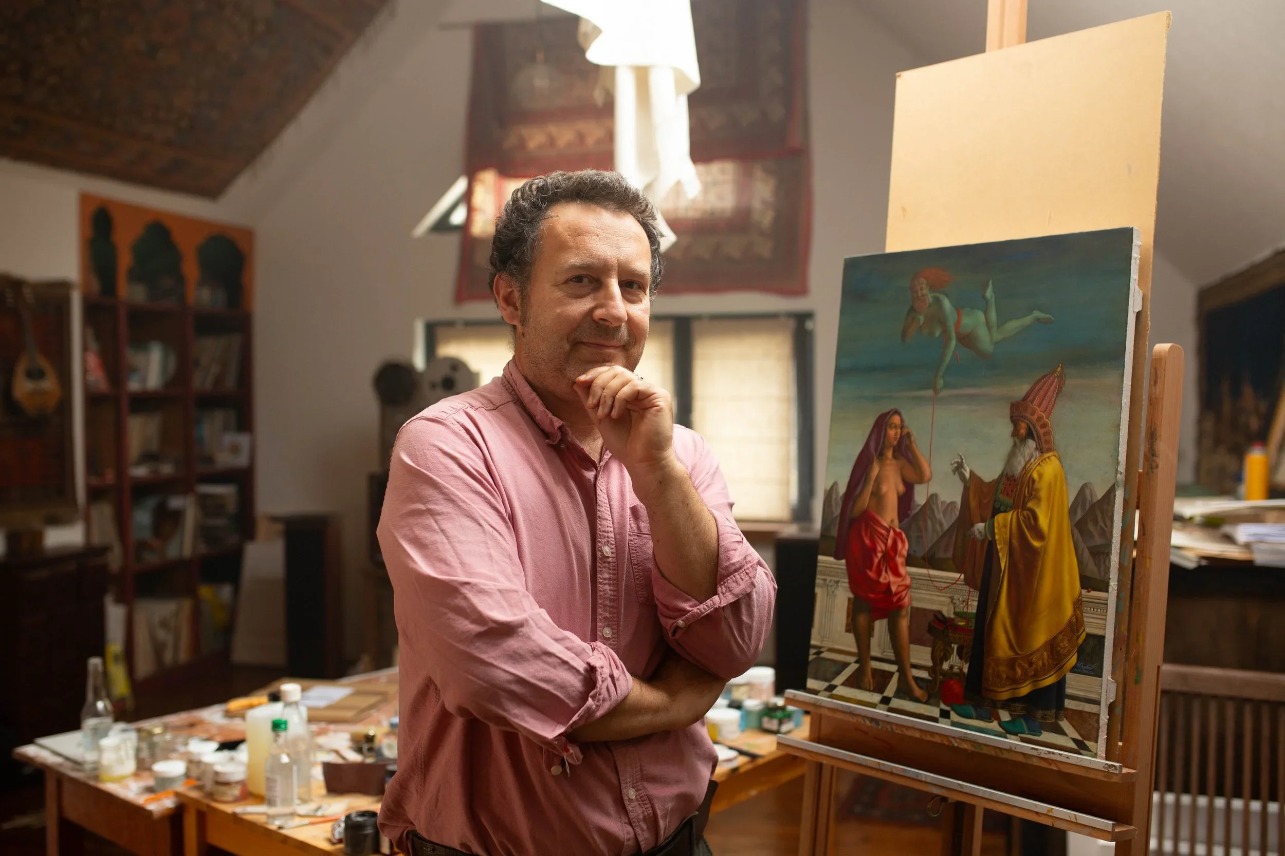 Image of Slawomir Chrystow wearing a pink shirt, smiling