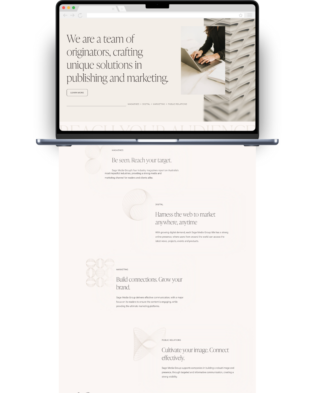 A laptop displaying a website related to publishing and marketing, with a hand using a laptop on a stack of printed pages in the background.