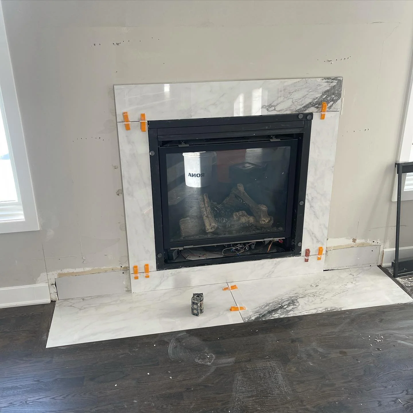 Custom fireplace with 2x4 ft tiles today!