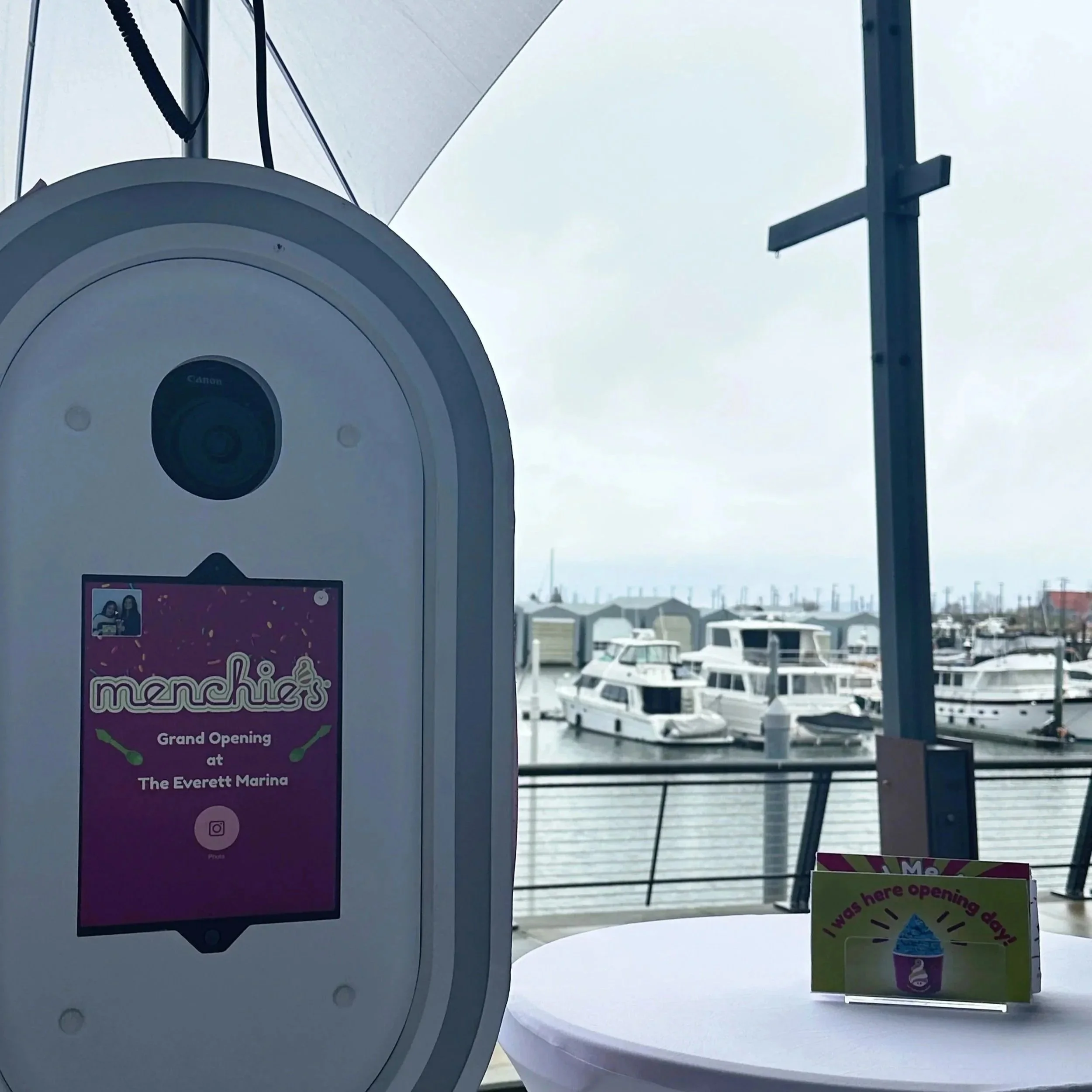 Menchie's branded photo booth screen interface with custom logo and purple branding Everett Washington