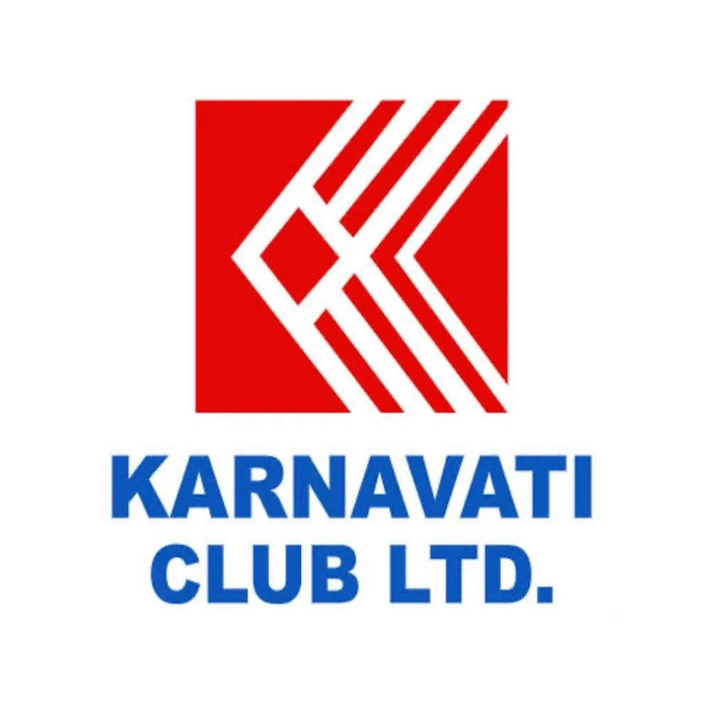 Karnavati Club Ltd logo with a red square containing a white geometric design and the words 'Karnavati Club Ltd' in blue.