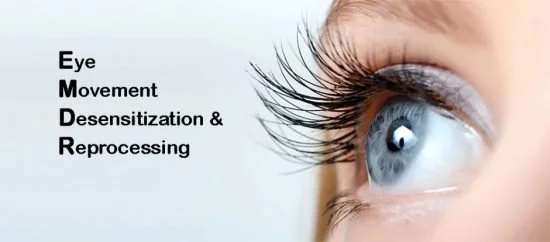 Close-up of a human eye with long eyelashes and blue iris, with text about eye movement desensitization and reprocessing (EMDR) in black font on the left.