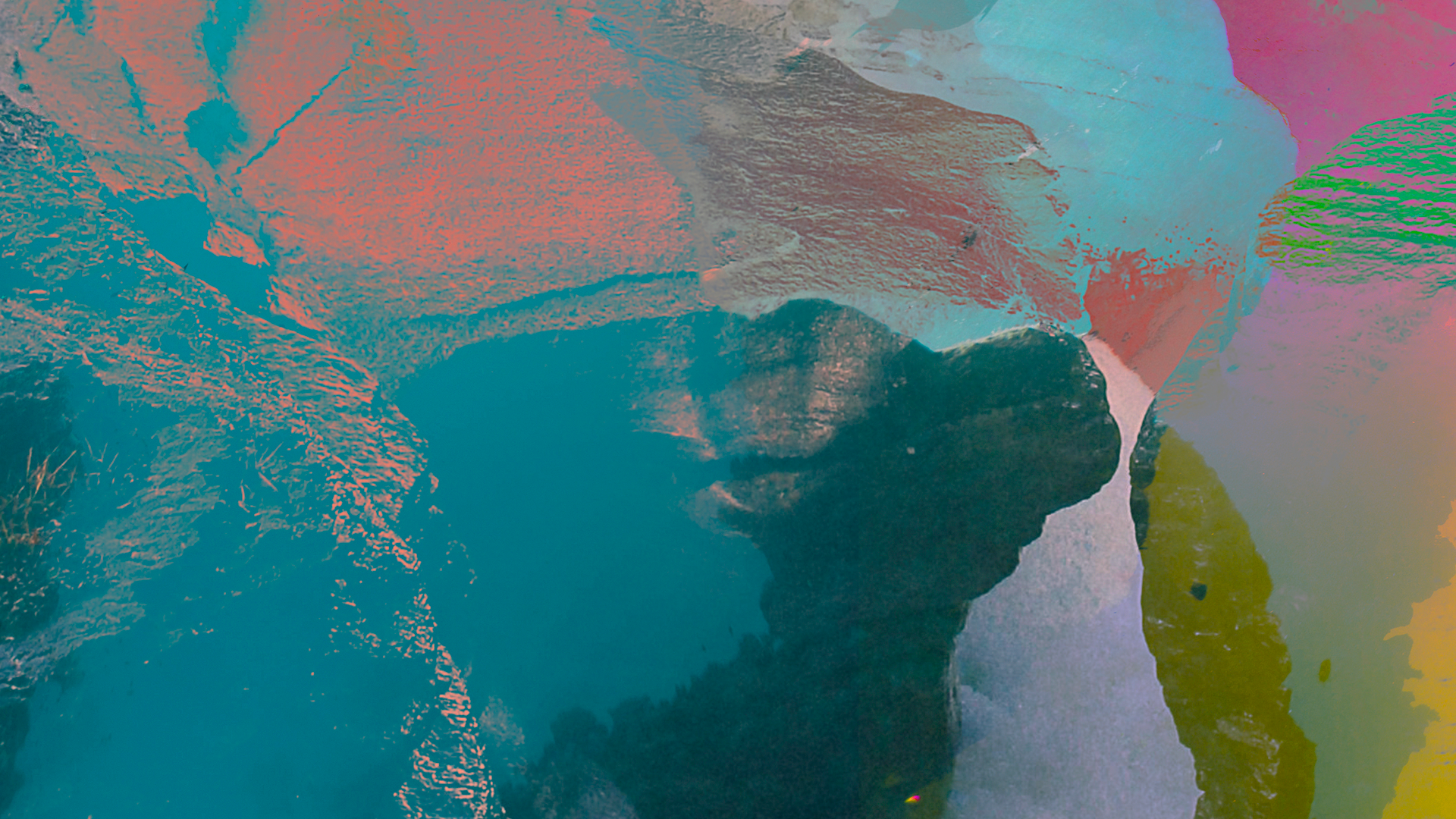 Abstract image of rocks with colorful overlays of blue, pink, green, and yellow.