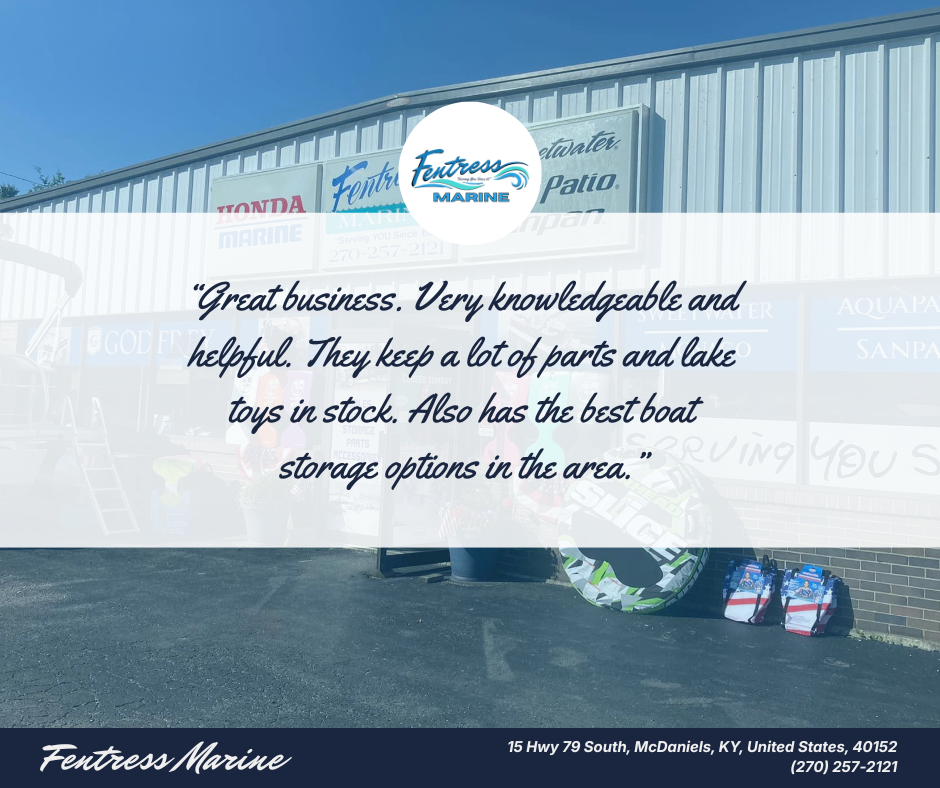 Exterior of Fentress Marine at 15 Hwy 79 South in McDaniels, Kentucky, with signage for Honda Marine and Aquabrite Sanpan, and boat accessories displayed outside.