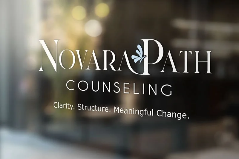 Sign for Novara Path Counseling with logo and tagline