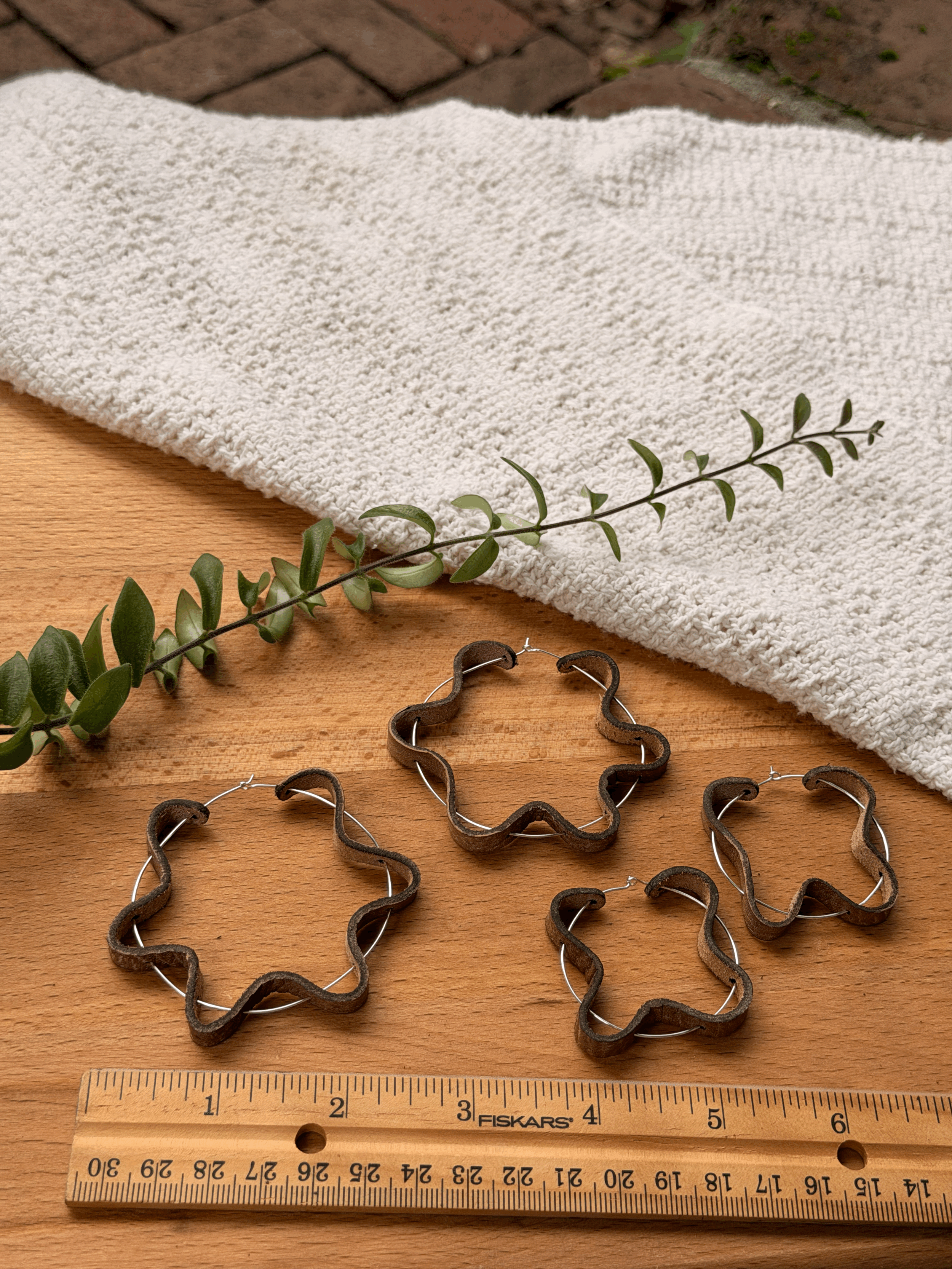 Squiggle Hoop Earrings shown in small and large sizes