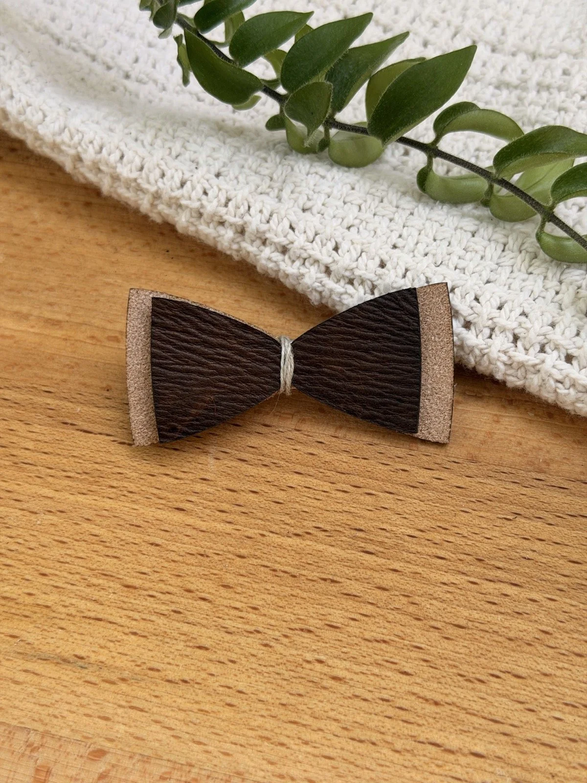 The Double Sophie Bow shown with the suede base finish and chocolate sumac top finish