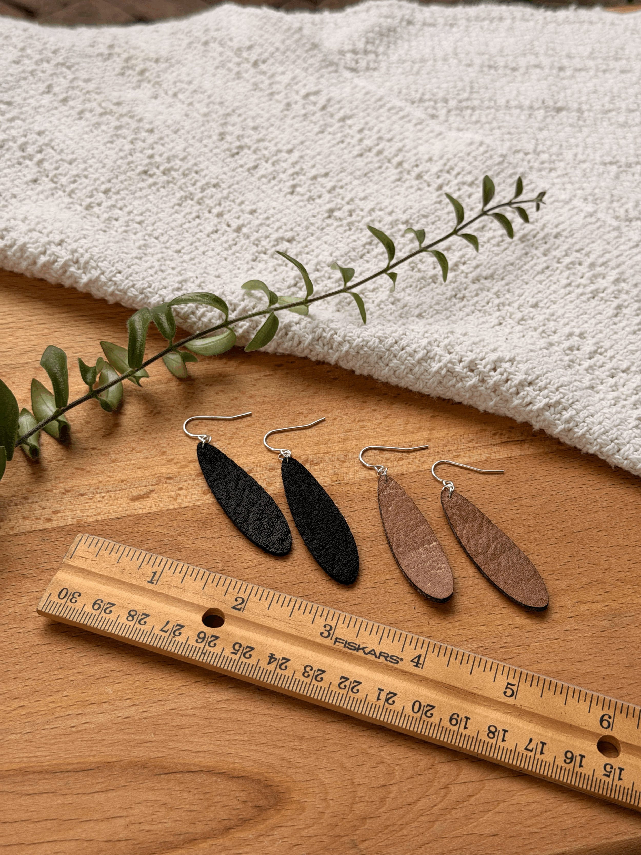 Teardrop earrings shown in various finishes