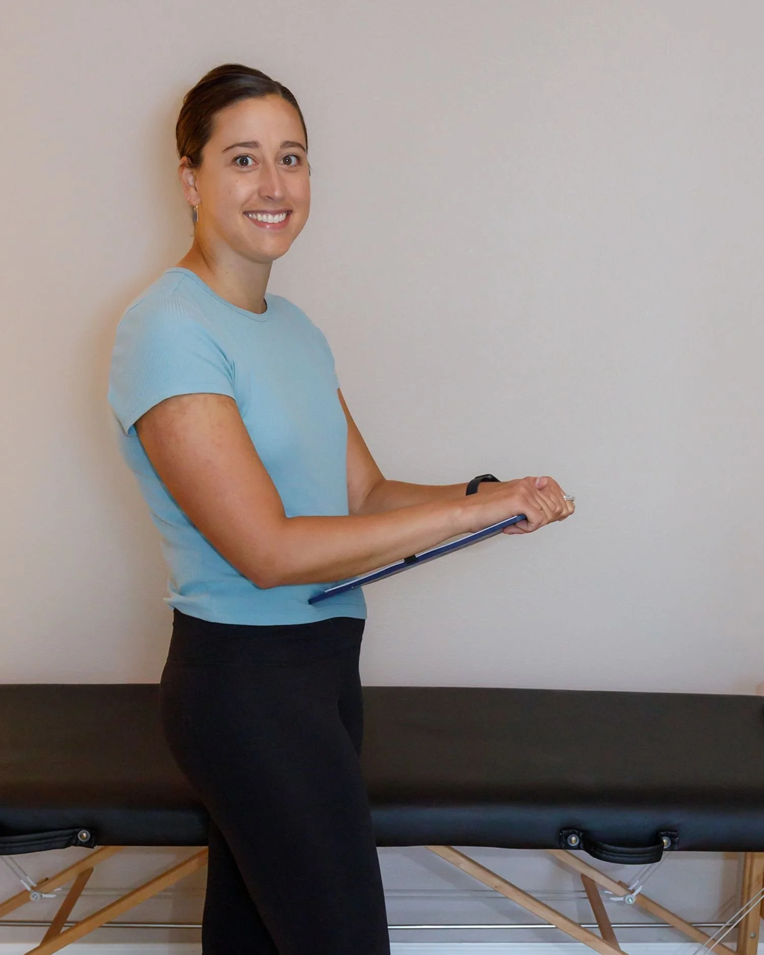 Sam a physical therapist in eagle river with pt clip board