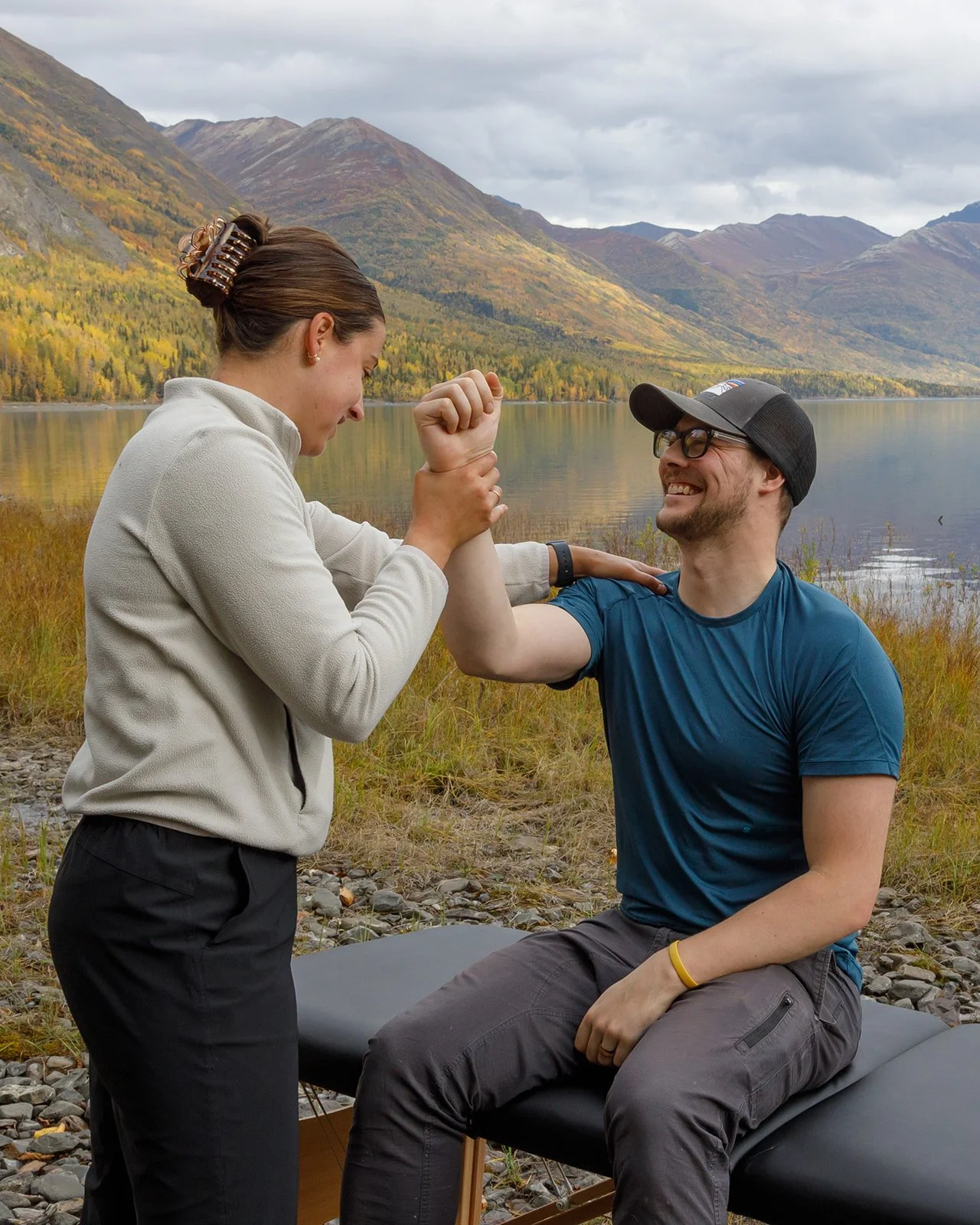 physical therapist working with client in alaska for athletic injury recovery