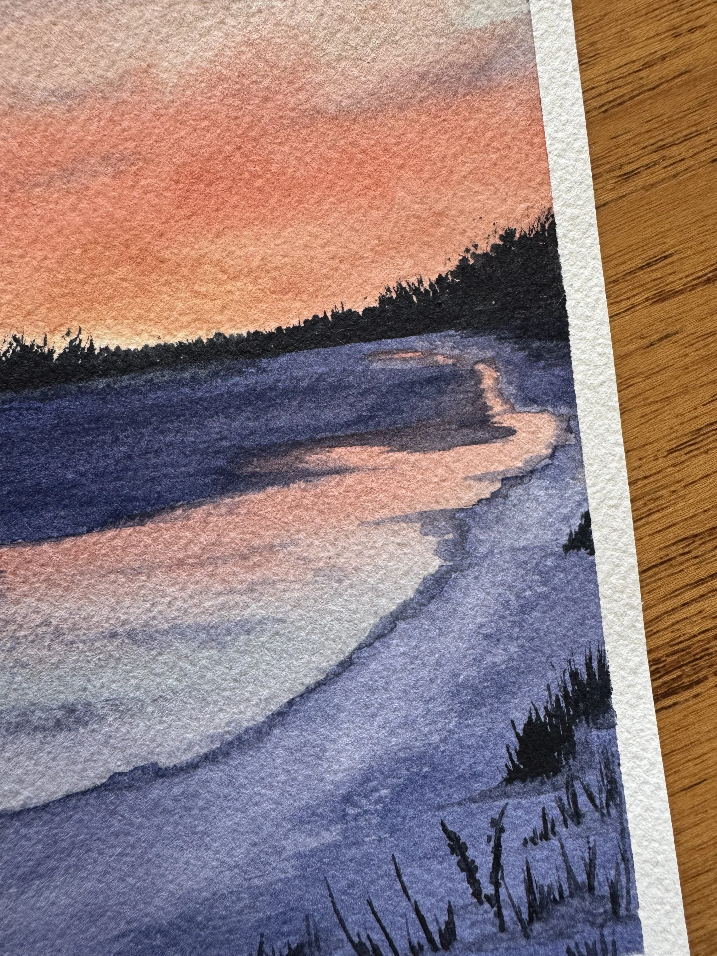 Original watercolour landscape painting of  a purple and orange sunrise on the bow river in Calgary