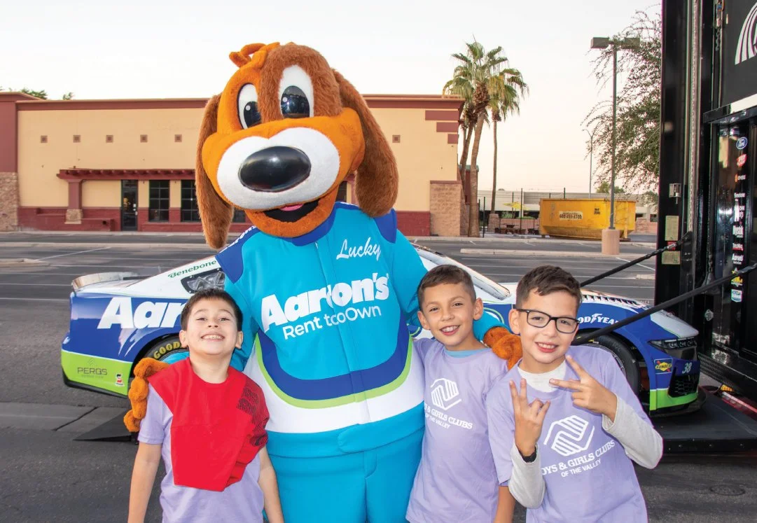 Aaron's Rent to Own racing mascot with the Boys and Girls Club.