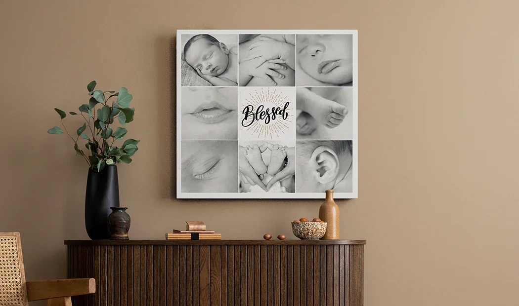 Black and white collage of nine photographs featuring a sleeping baby, close-up of hands and lips, feet, and an ear, with the word 'Blessed' in the center.