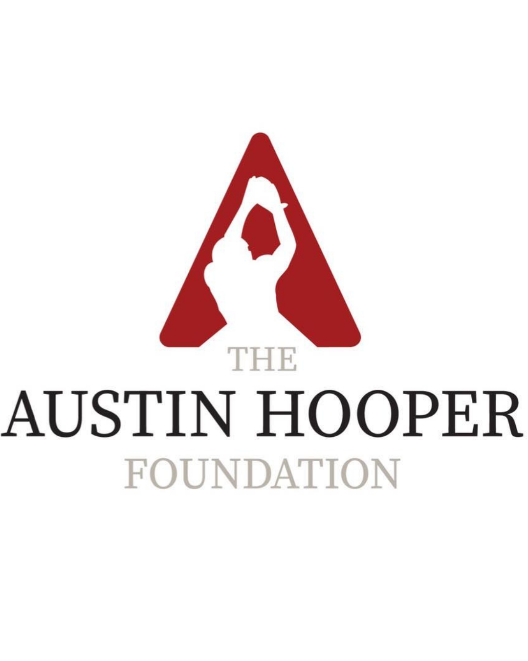 Logo for the Austin Hooper Foundation featuring a silhouette of a woman stretching above a red triangular shape with the foundation's name below.