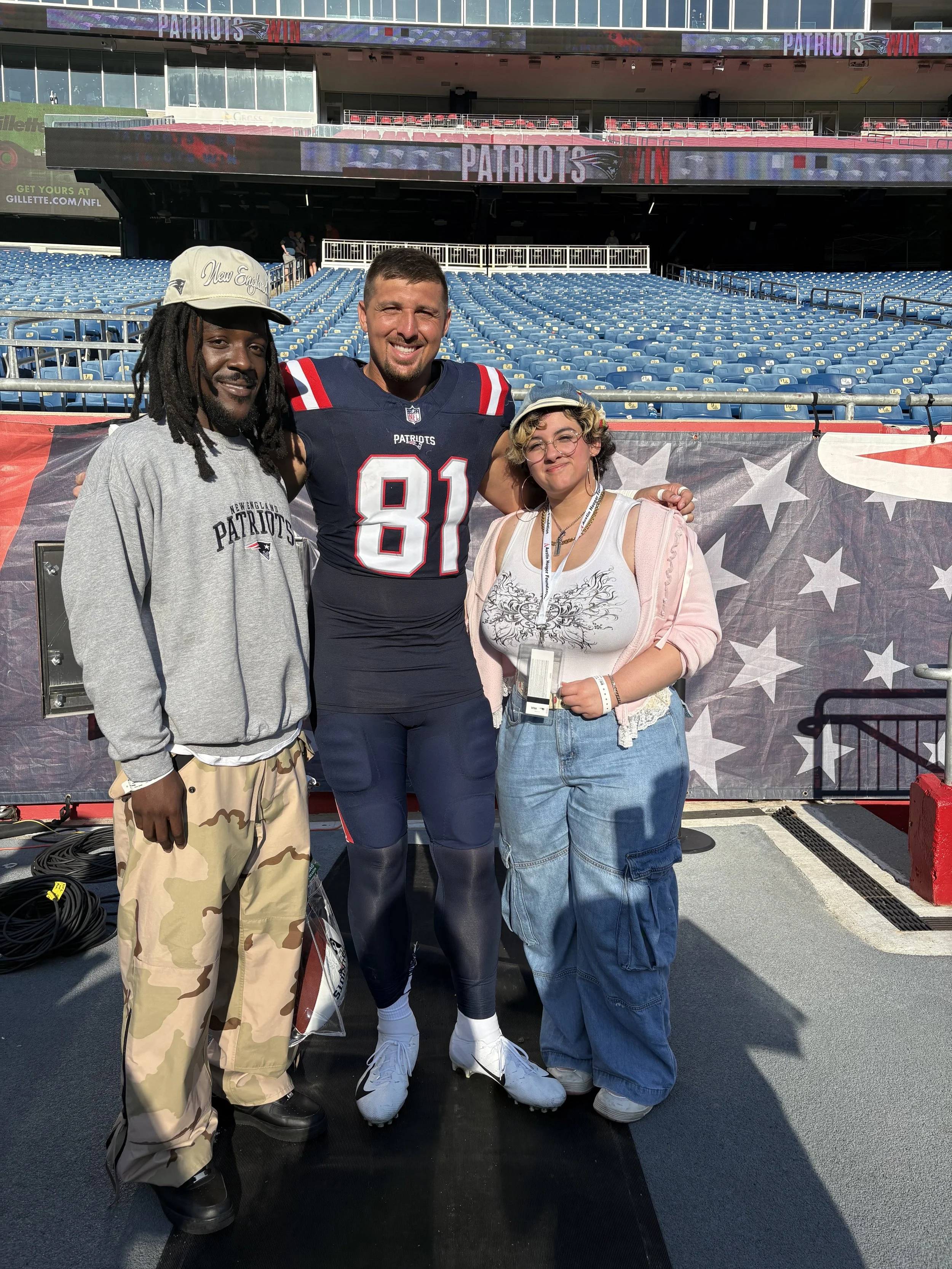 New England Patriots NFL Austin Hooper with Artem vale and foster youth at gillette stadium for game