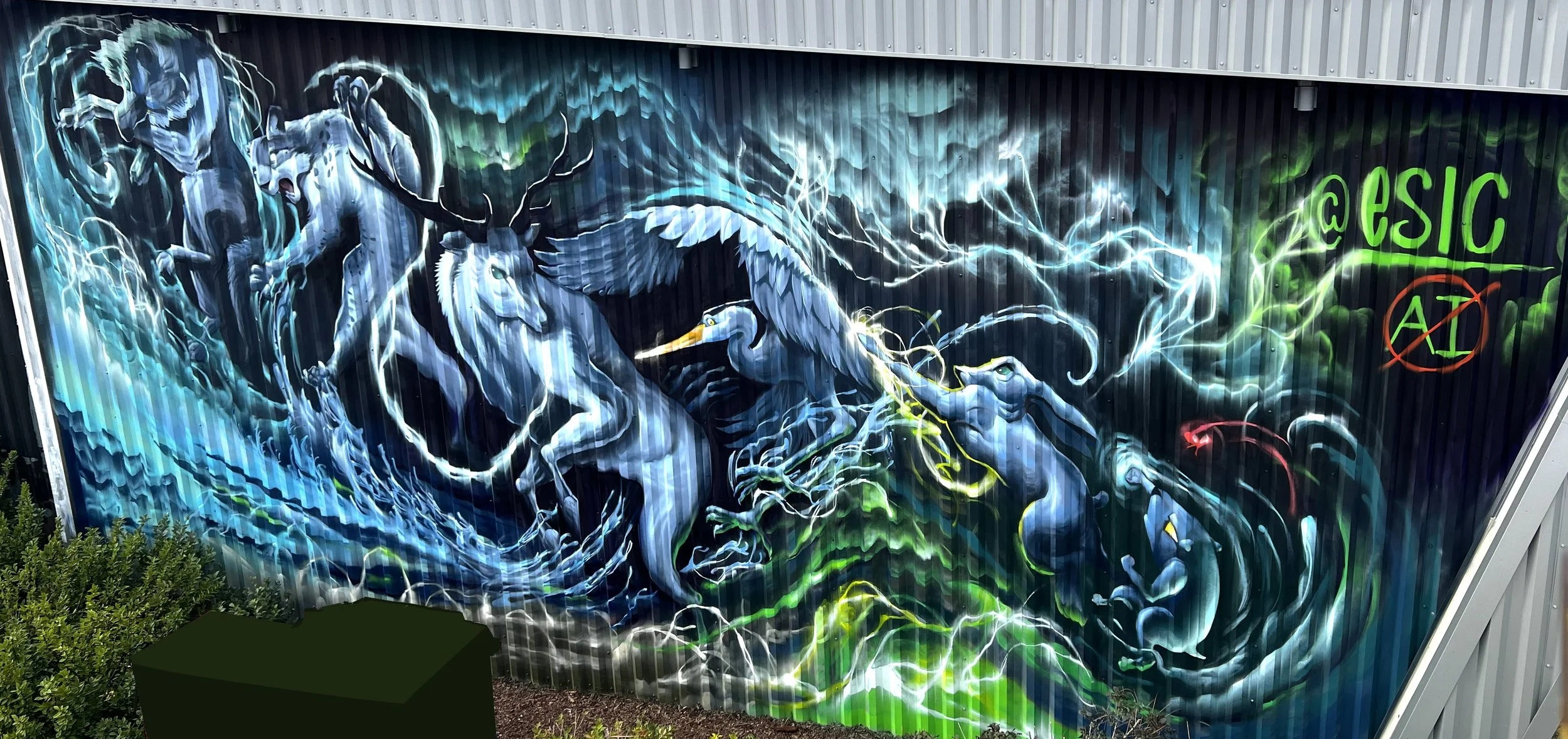 A vibrant mural of mythical creatures, featuring a fierce wolf, a majestic deer with antlers, and a heron, surrounded by blue lightning and swirling green energy on a metal wall. The mural includes text reading 'CESC' and environmental symbols.