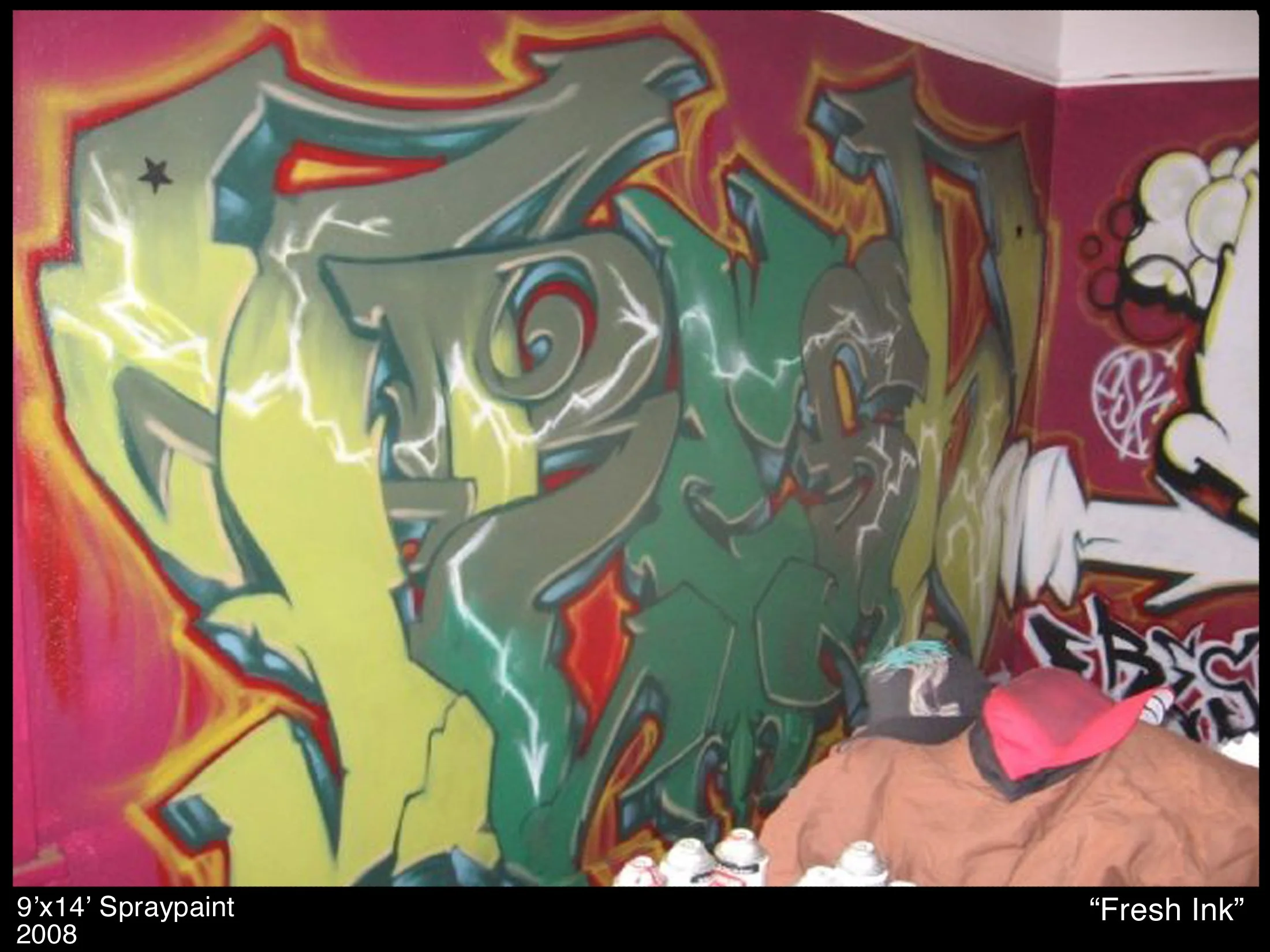 Colorful graffiti spray paint art on a wall, with dynamic shapes and lightning effects, titled "Fresh Ink" from 2008, measuring 9x14 feet.