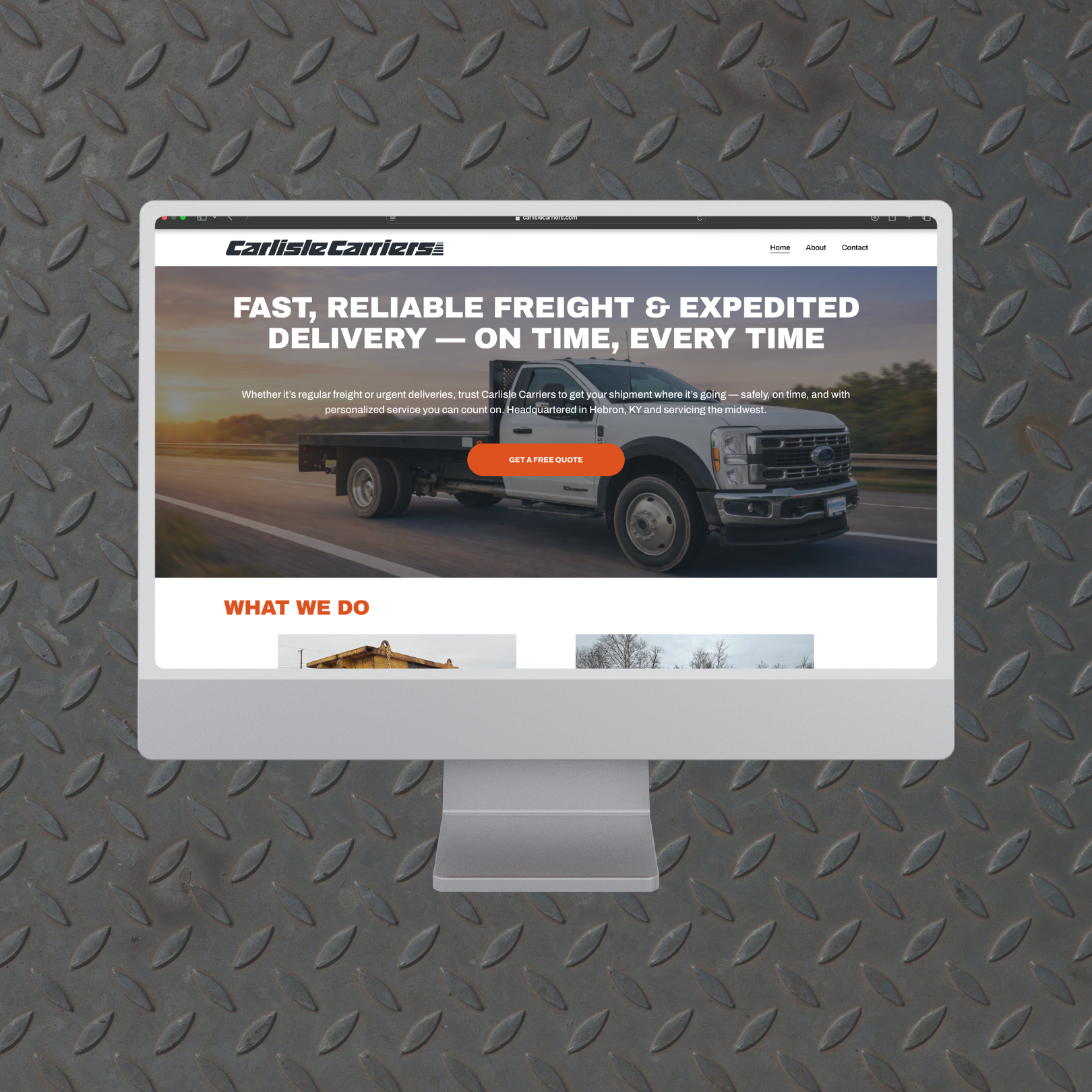 Visual Branding applied to website (mockup) in front of steel plate